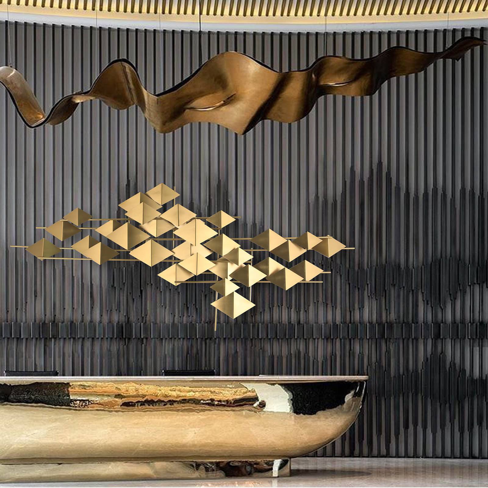 Handcrafted stainless steel artwork called The Flock by BEACON, featuring intricate design and metal craftsmanship.