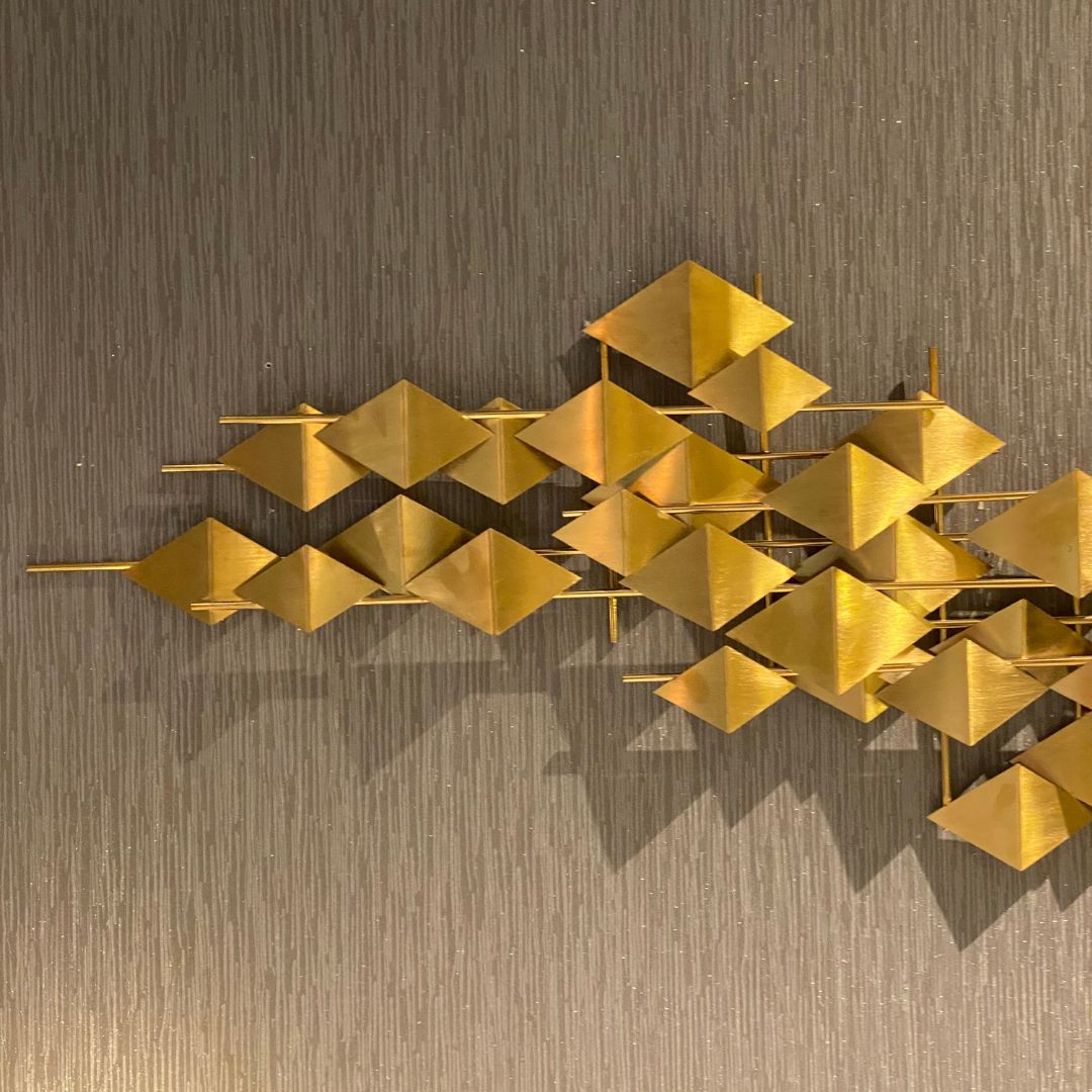 Handcrafted stainless steel artwork titled The Flock by BEACON, displayed as a modern decorative art piece.