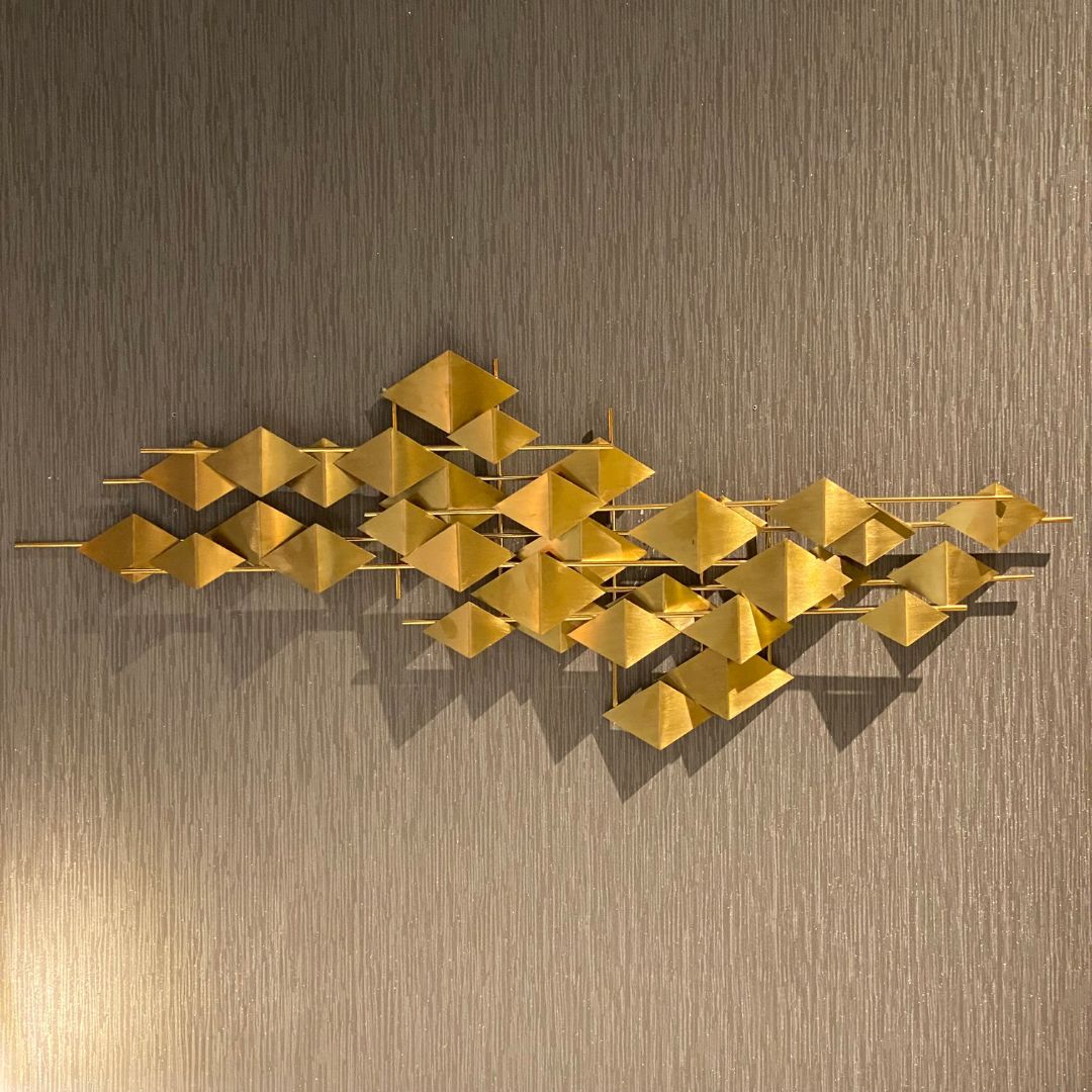 Handcrafted stainless steel artwork called The Flock by Beacon, displayed as a decorative art piece with intricate metal detailing.