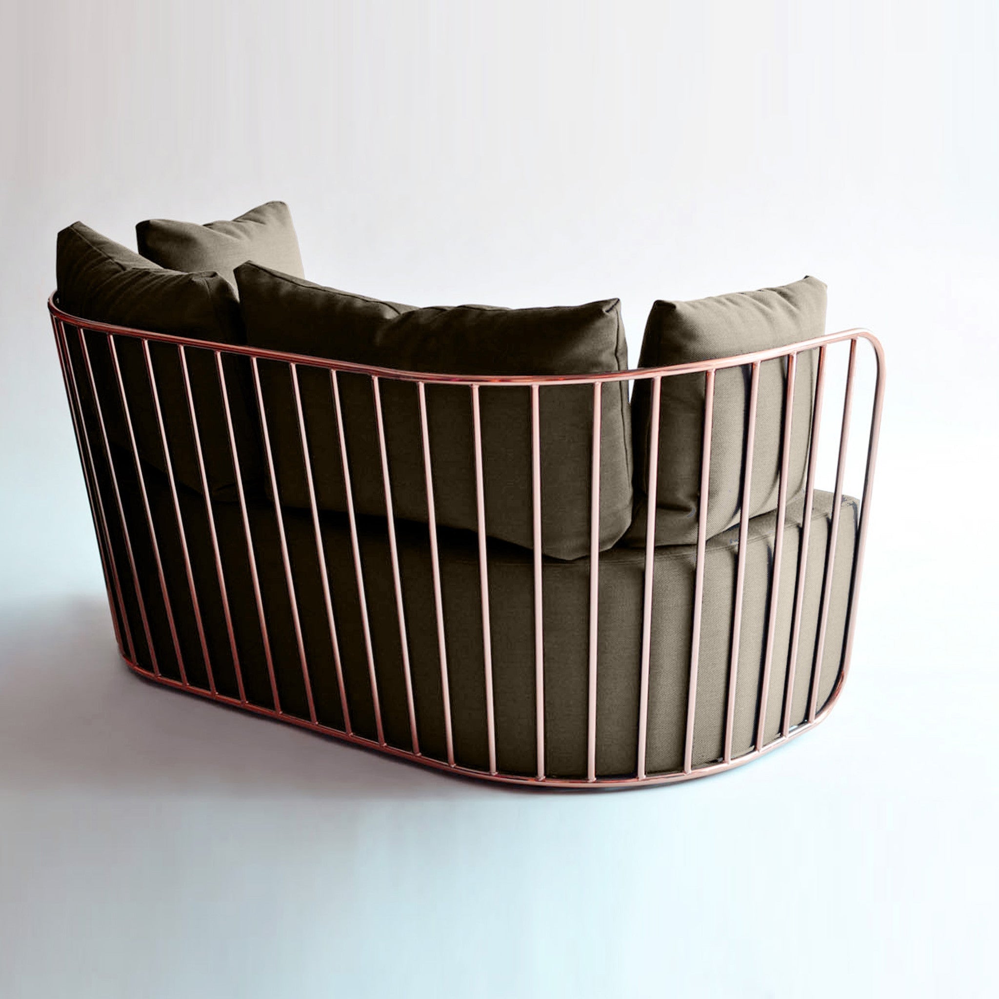 Display of Torino stainless steel armchair by BEACON, featuring sleek modern design with stainless steel frame and plush upholstery.
