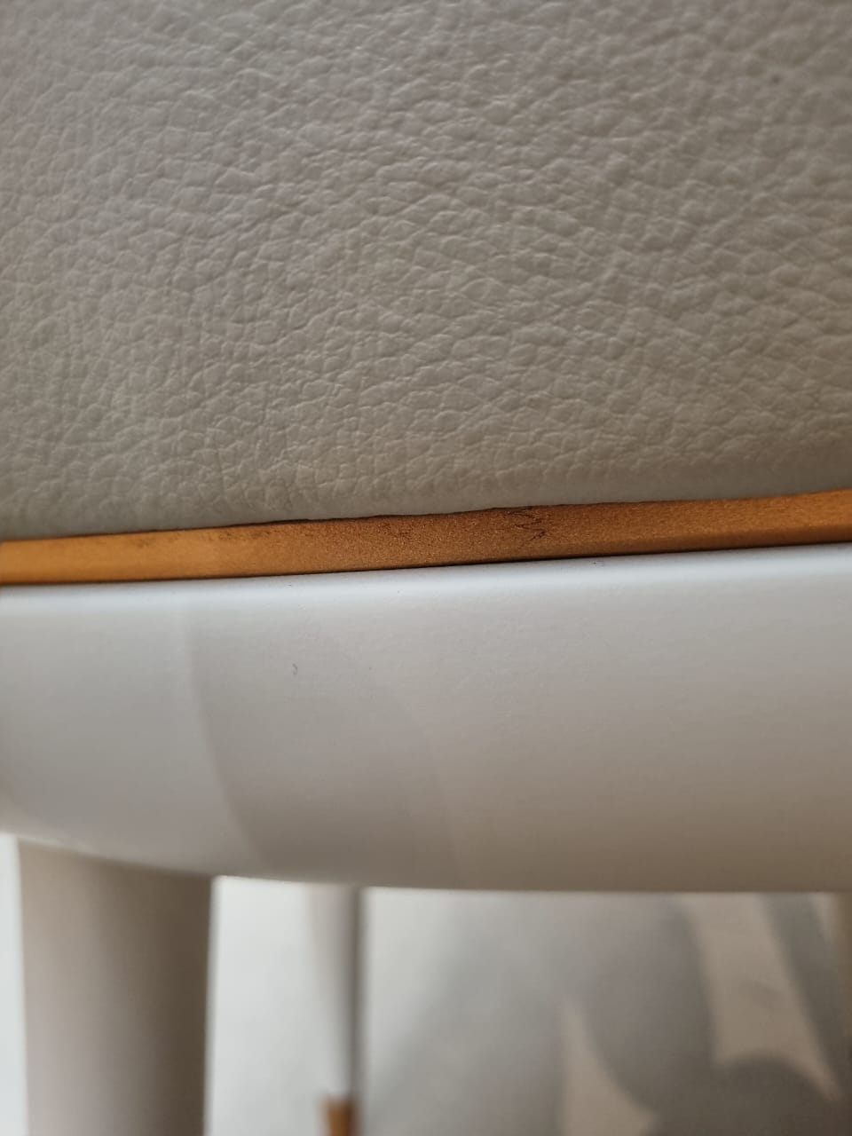 Display of LODA Furniture Tulip Dining Chair in yellow with a modern, curved plastic seat and metal base.