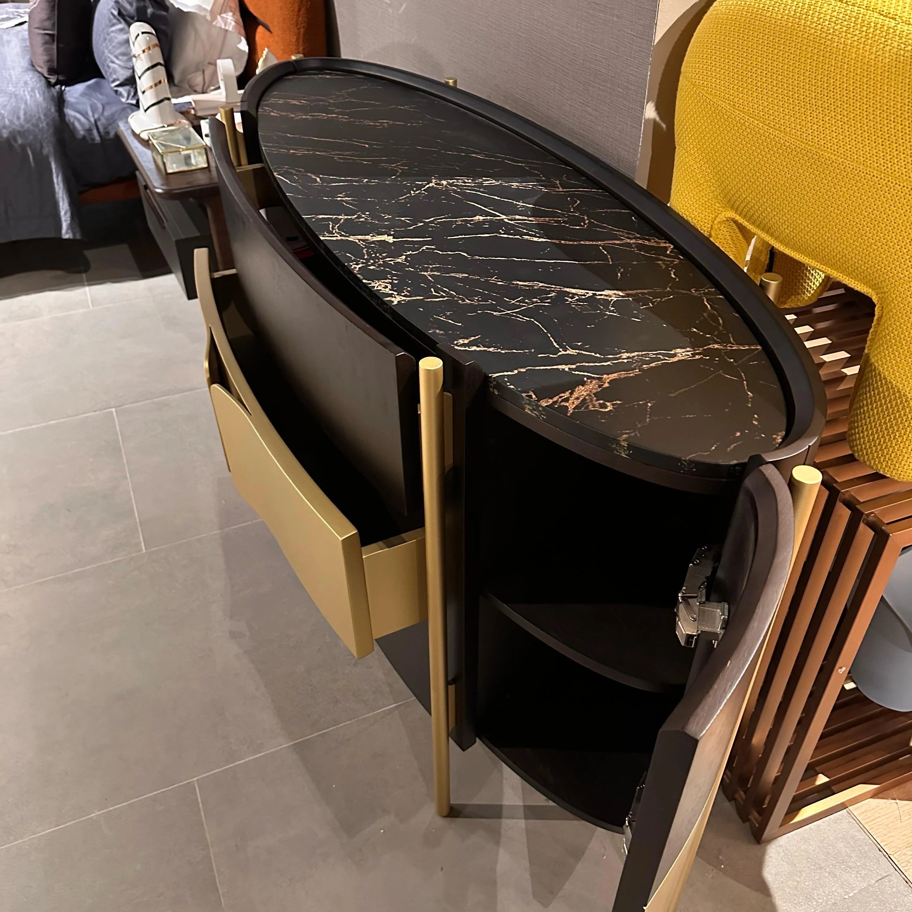 Display of the Vega Chest of Drawers dresser in gold walnut finish, 158cm, by Loda Furniture featuring multiple drawers.