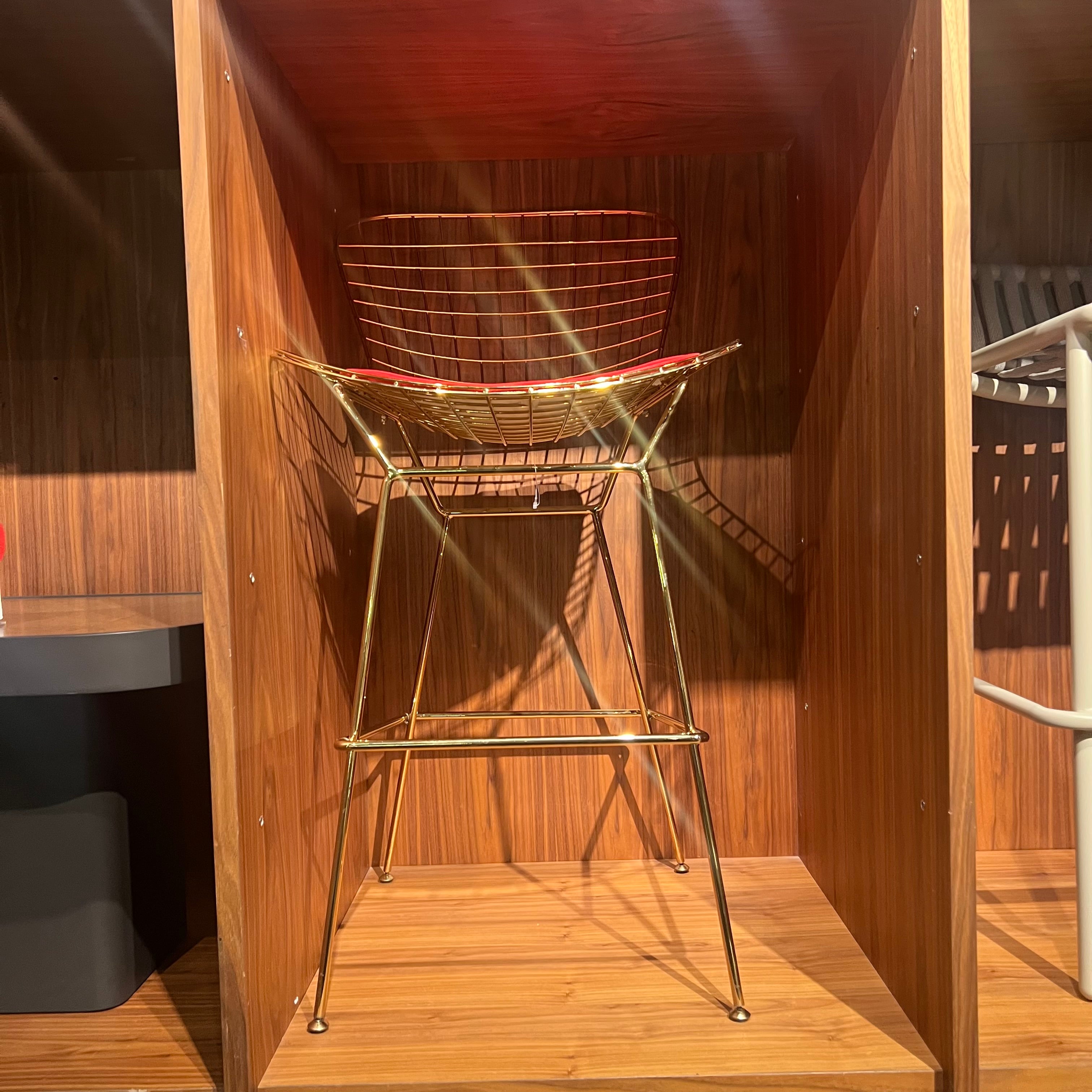 Wire bar stool with black PU leather cushion, displayed as a sample for BEACON MO BP8601-G Nakheel showcase.