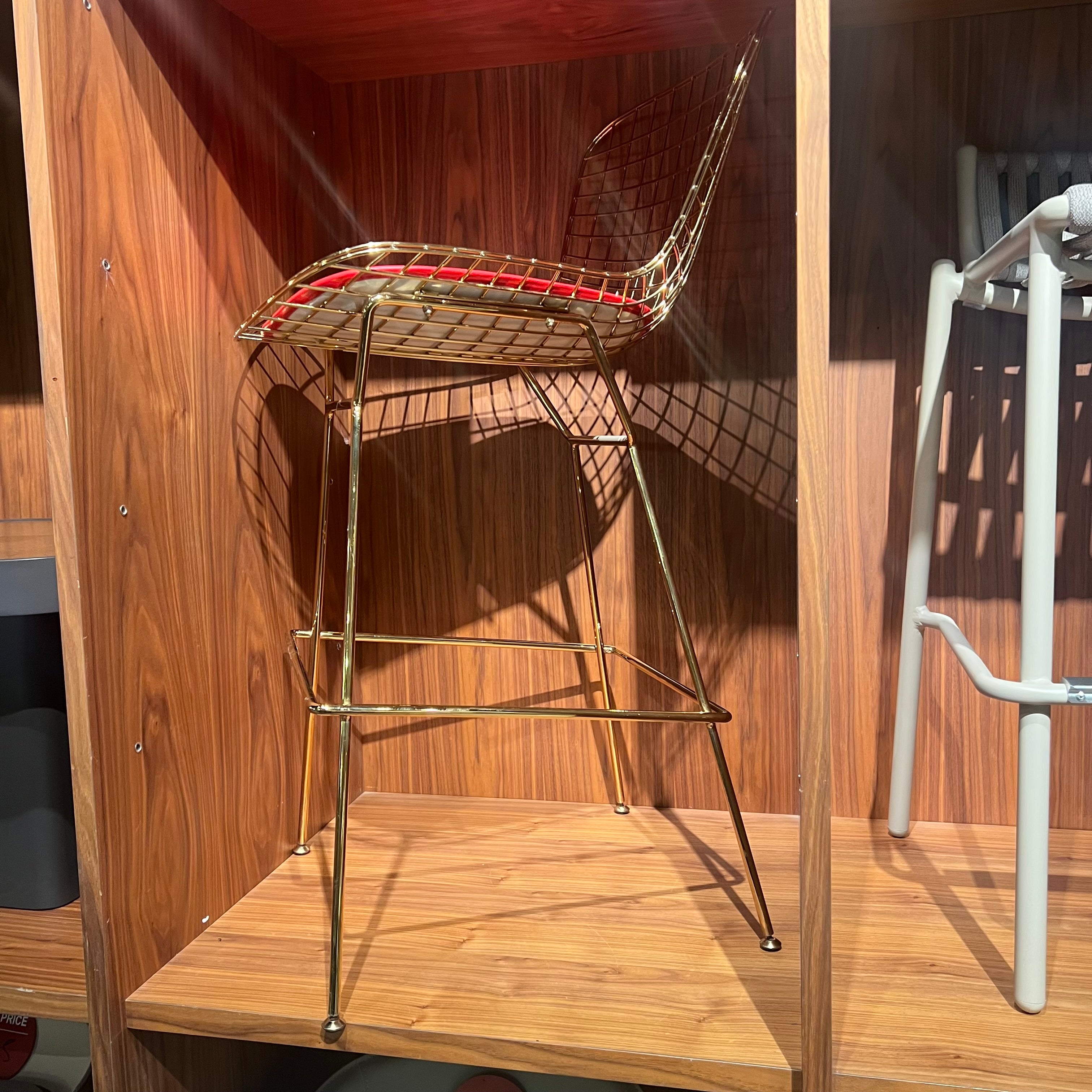 Wire bar stool with PU leather cushion, BEACON Nakheel display item, modern seating with sleek metal frame and comfortable padding