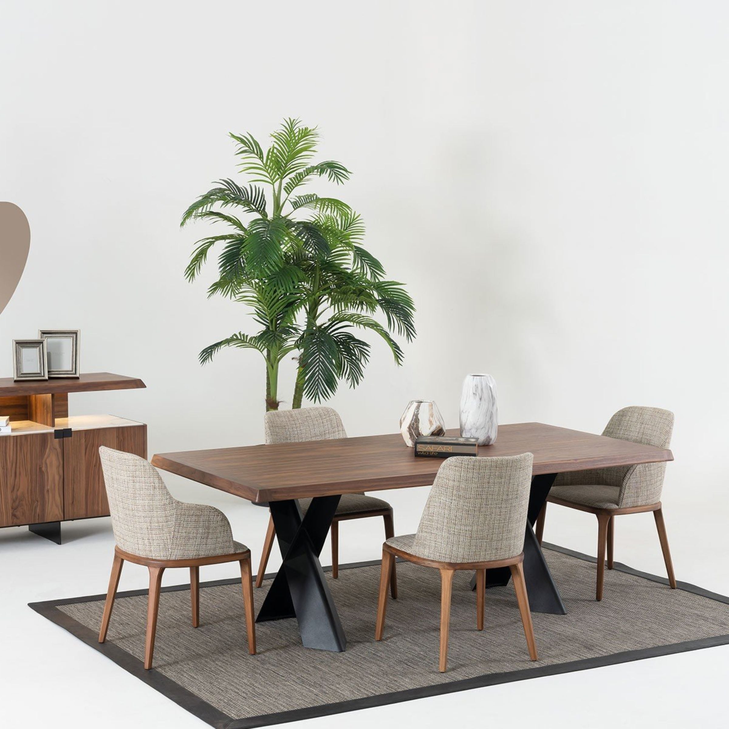 Display piece of the Genova dining table by YOL LIVING, showcasing the wooden tabletop and modern design.