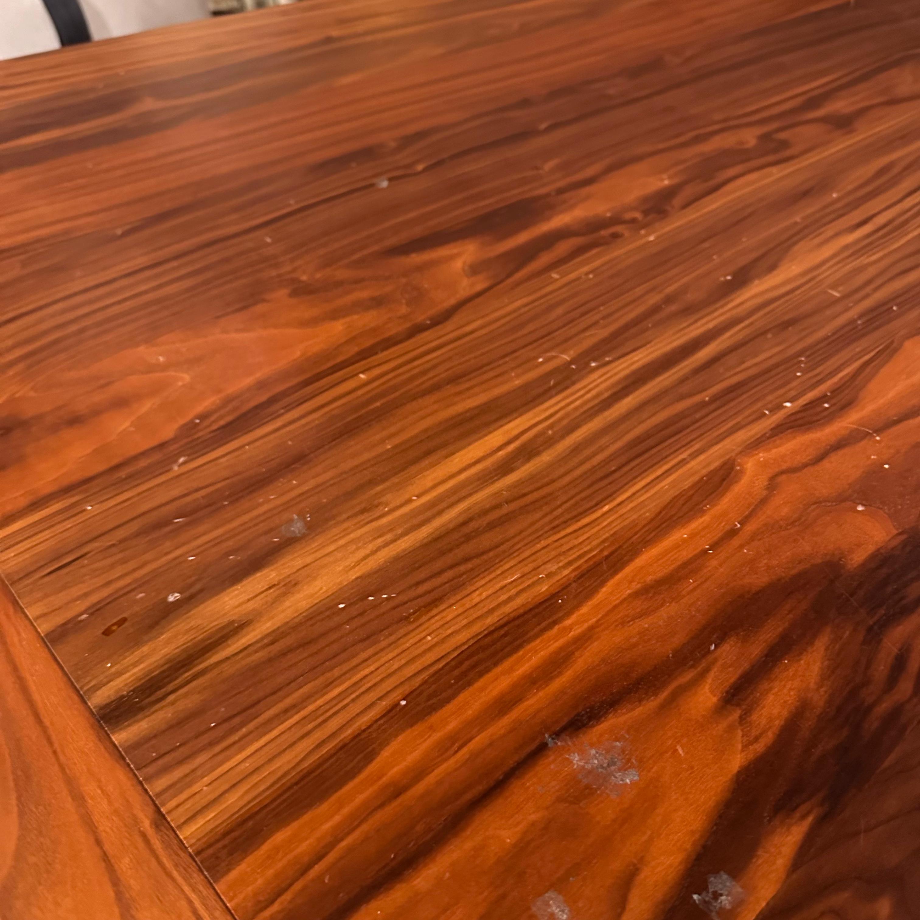 Display piece of the Genova dining table by YOL LIVING, showcasing the modern wooden design and craftsmanship.