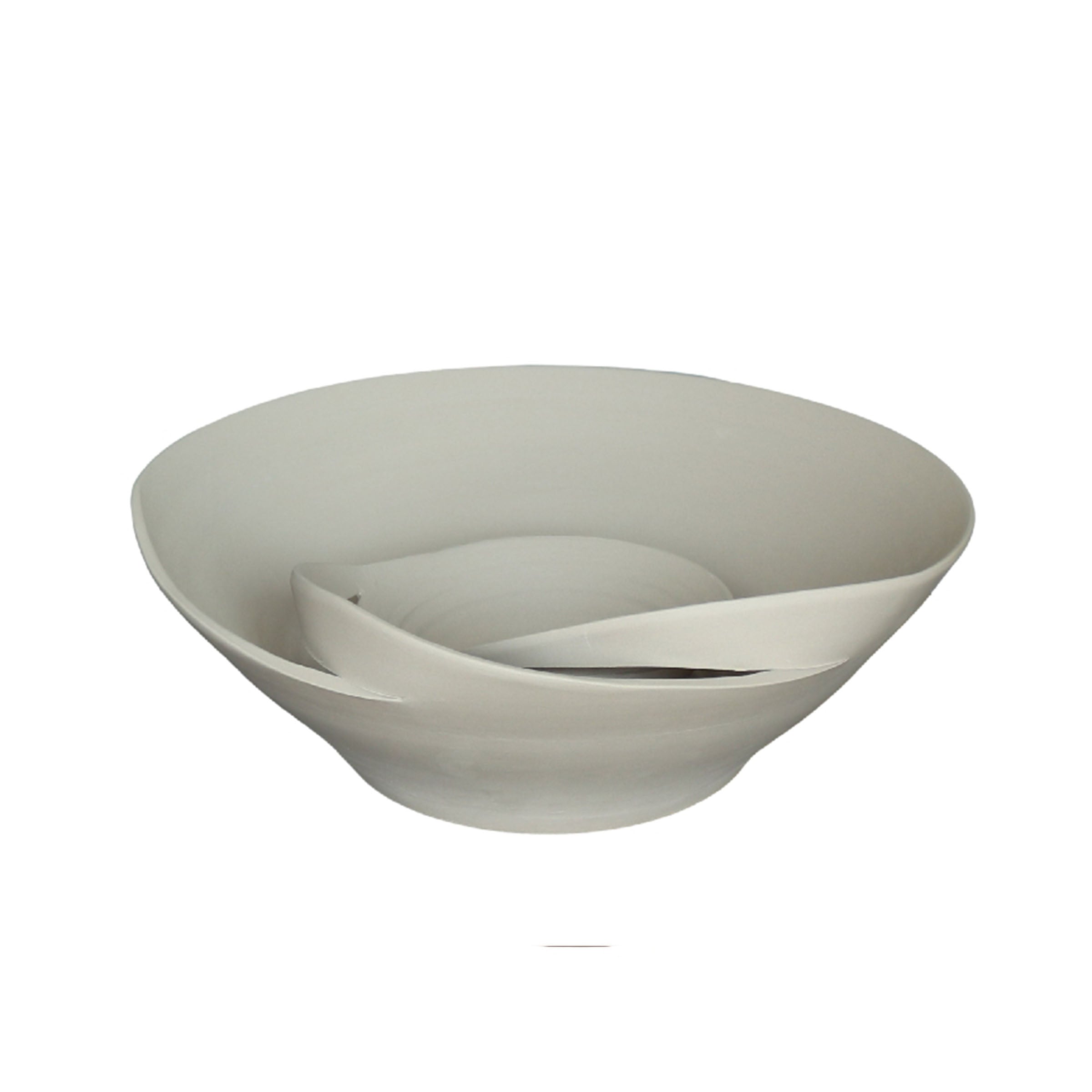 Dreamy beige ceramic bowl by BEACON, perfect for serving or display, with a smooth, elegant finish.