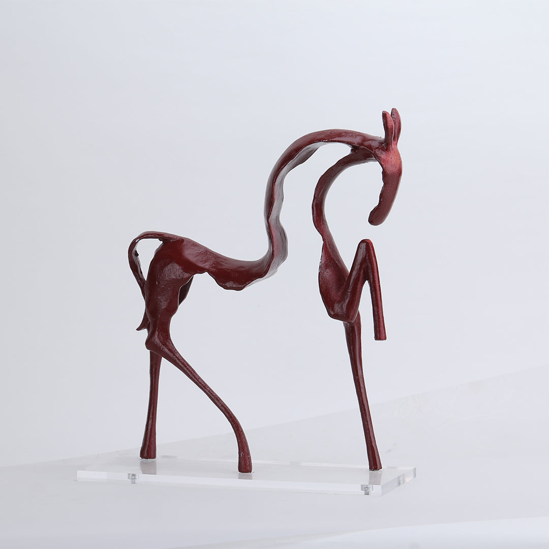 Red line horse sculpture by BEACON, striking home decor figurine showcasing dynamic equine artistry in vibrant red.