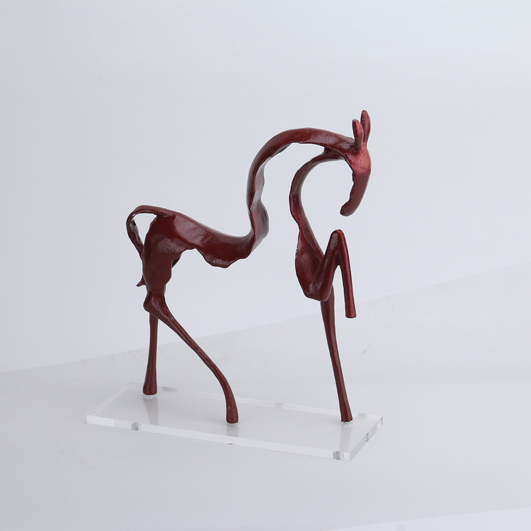 Red line horse sculpture by BEACON, striking home decor figurine showcasing dynamic equine artistry.