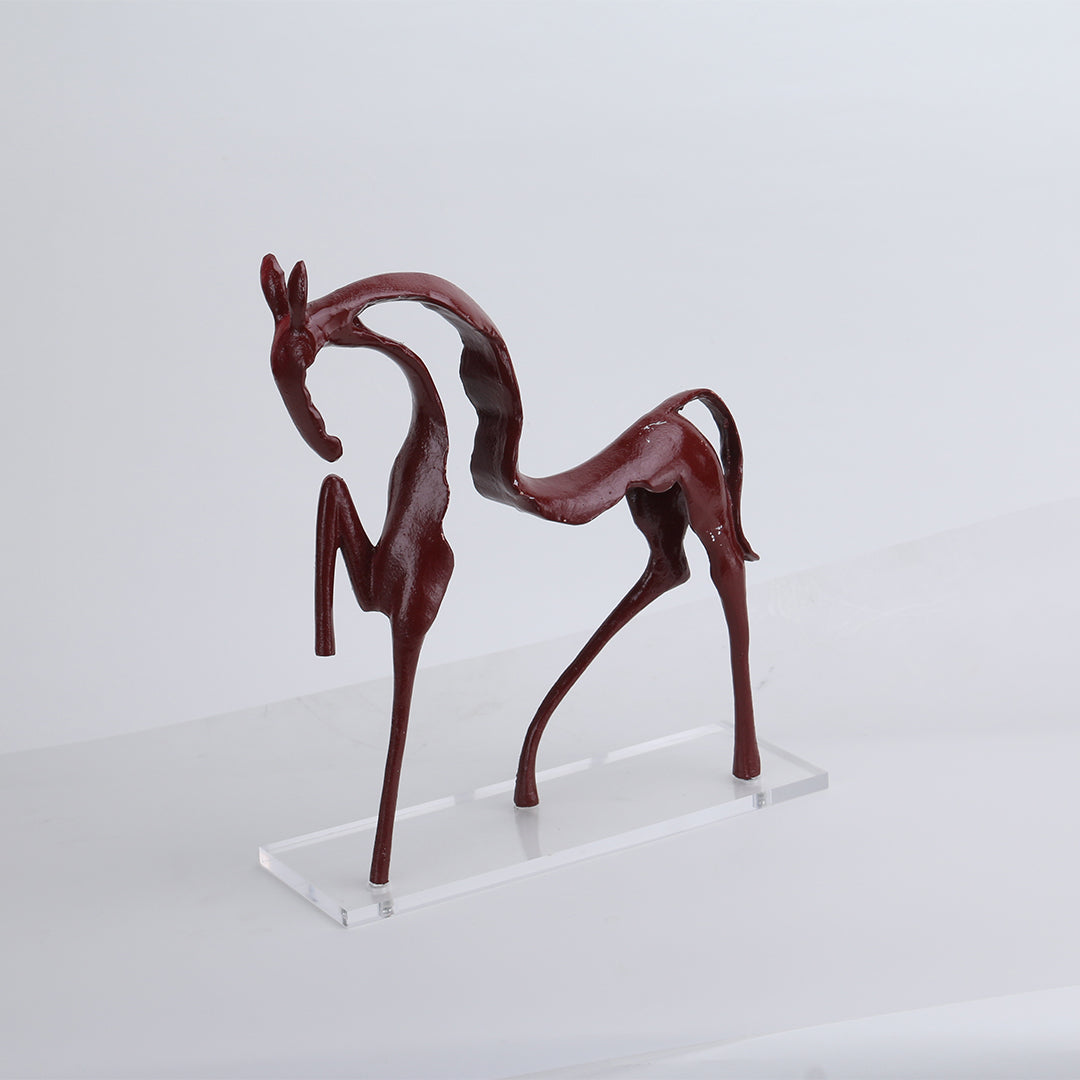 Red line horse sculpture by BEACON, dynamic equine home decor figurine featuring striking, modern horse artistry.