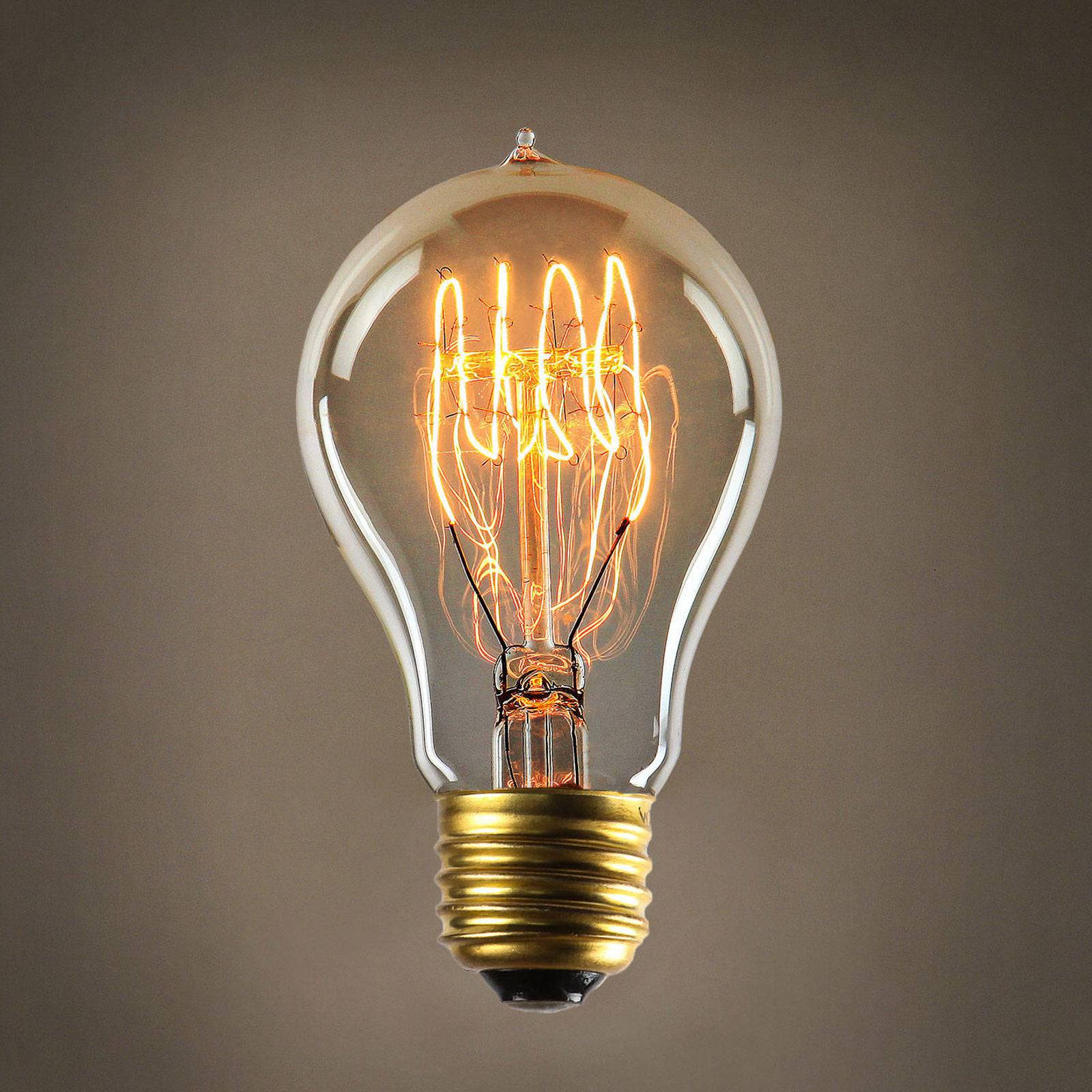 E27 Edison A19 bulb by BEACON with clear glass and filament, designed for decorative lighting fixtures.