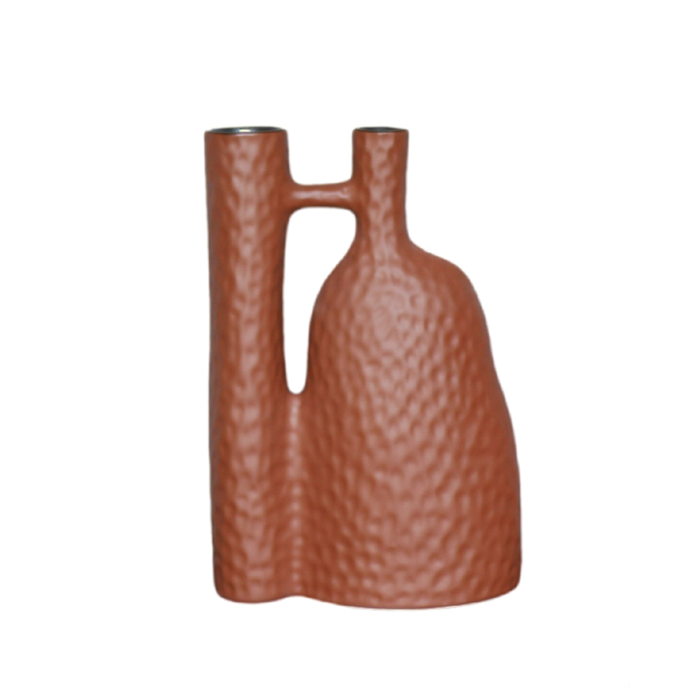 Earthy terracotta brown clay vase by BEACON, featuring a rounded shape and textured surface for rustic home decor.