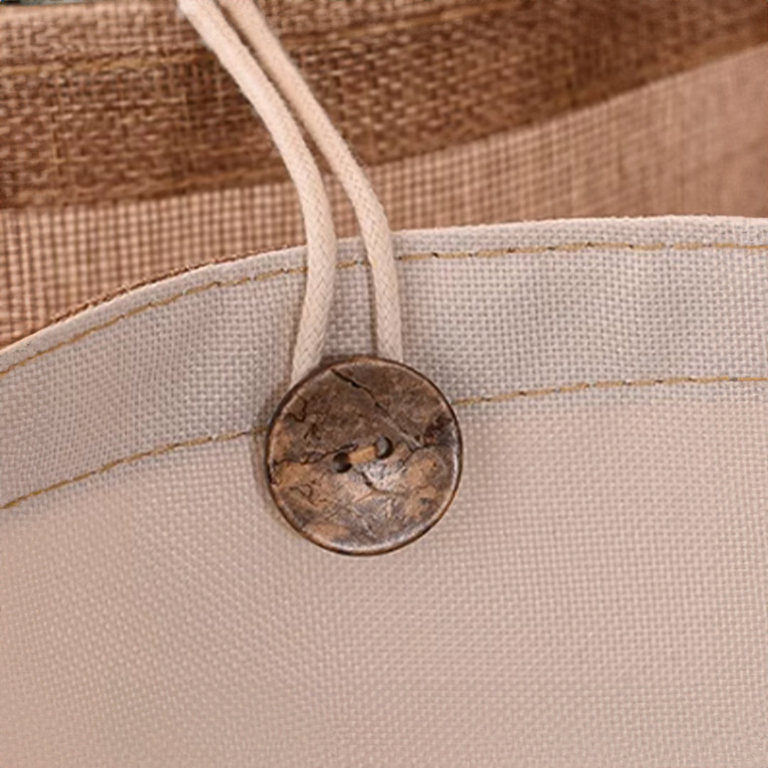 Handmade EBARZA jute bag basket by BEACON, featuring natural woven jute material and sturdy handles for versatile use.