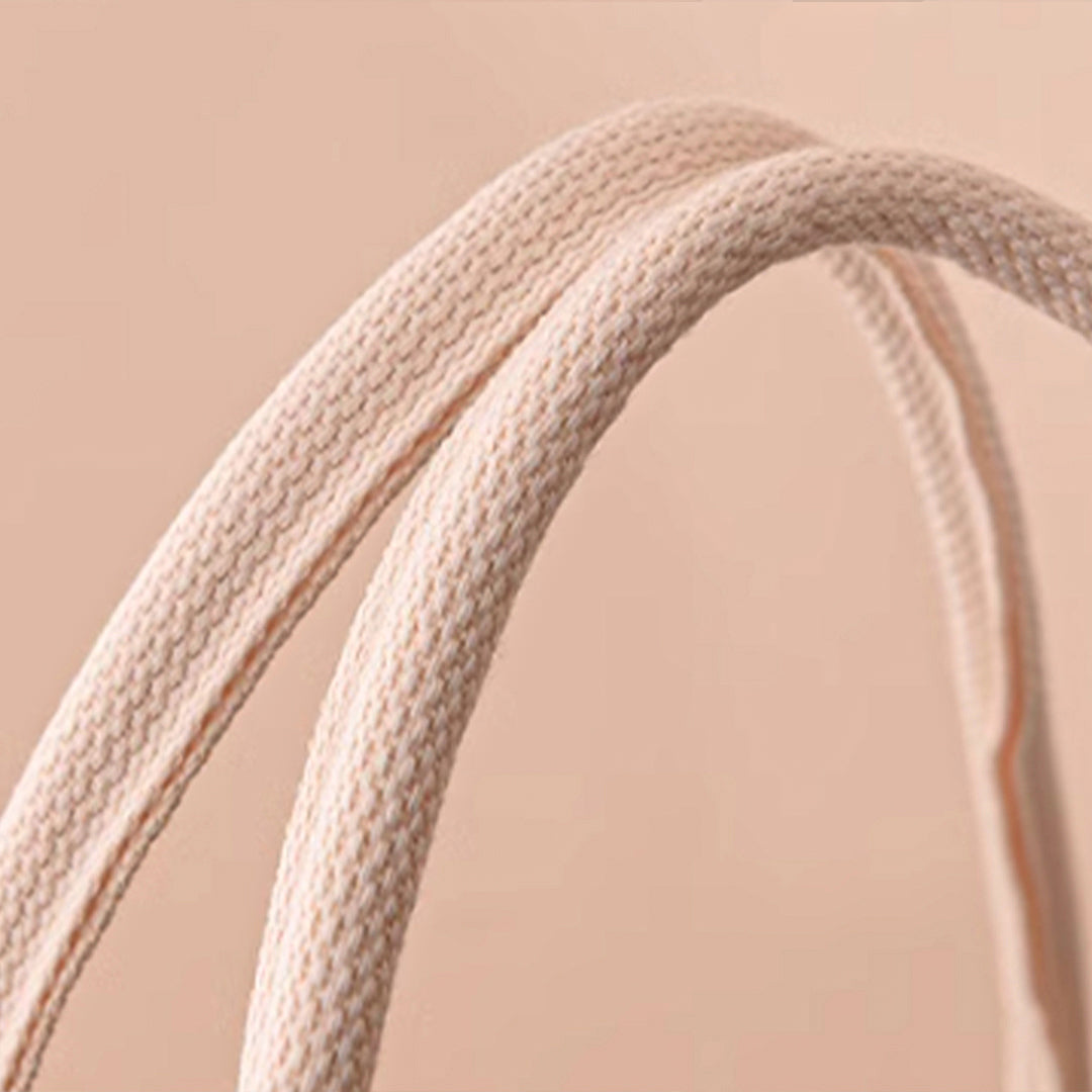 Handmade jute basket by BEACON, EBARZA, featuring natural woven design for storage or decoration.