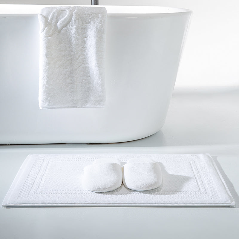 Ebiza Jacquard Bath Mat from BEACON featuring a textured fabric design, soft and absorbent for bathroom use.