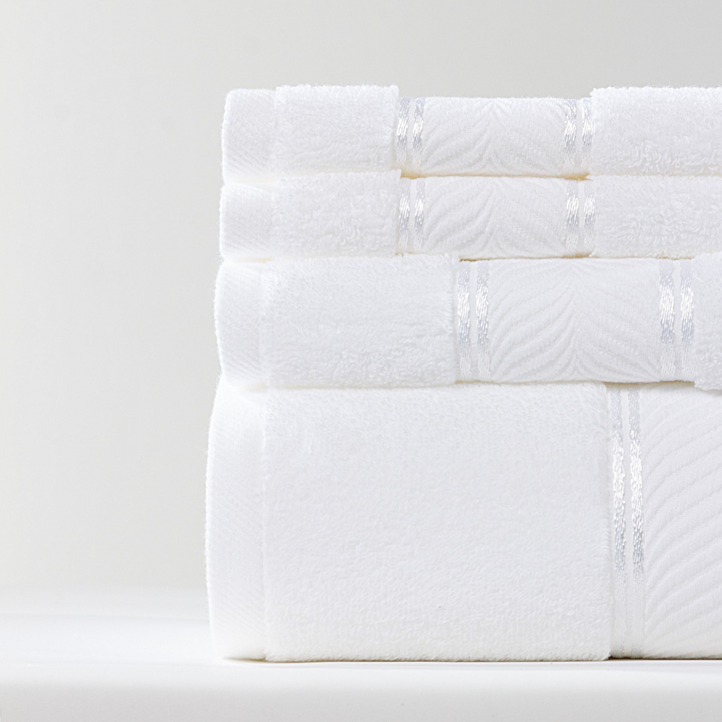 Set of shiny towels from the ebarza Shinning Towel Set EBTS-002 by BEACON, featuring soft, plush fabric in a stylish design.