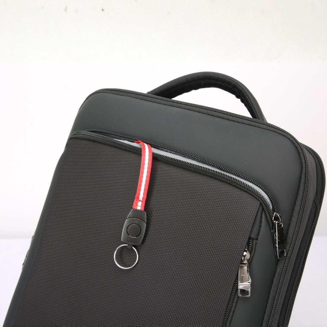 Ebarza traveling backpack by BEACON, durable black bag with multiple compartments, adjustable straps, and sturdy handles for travel.