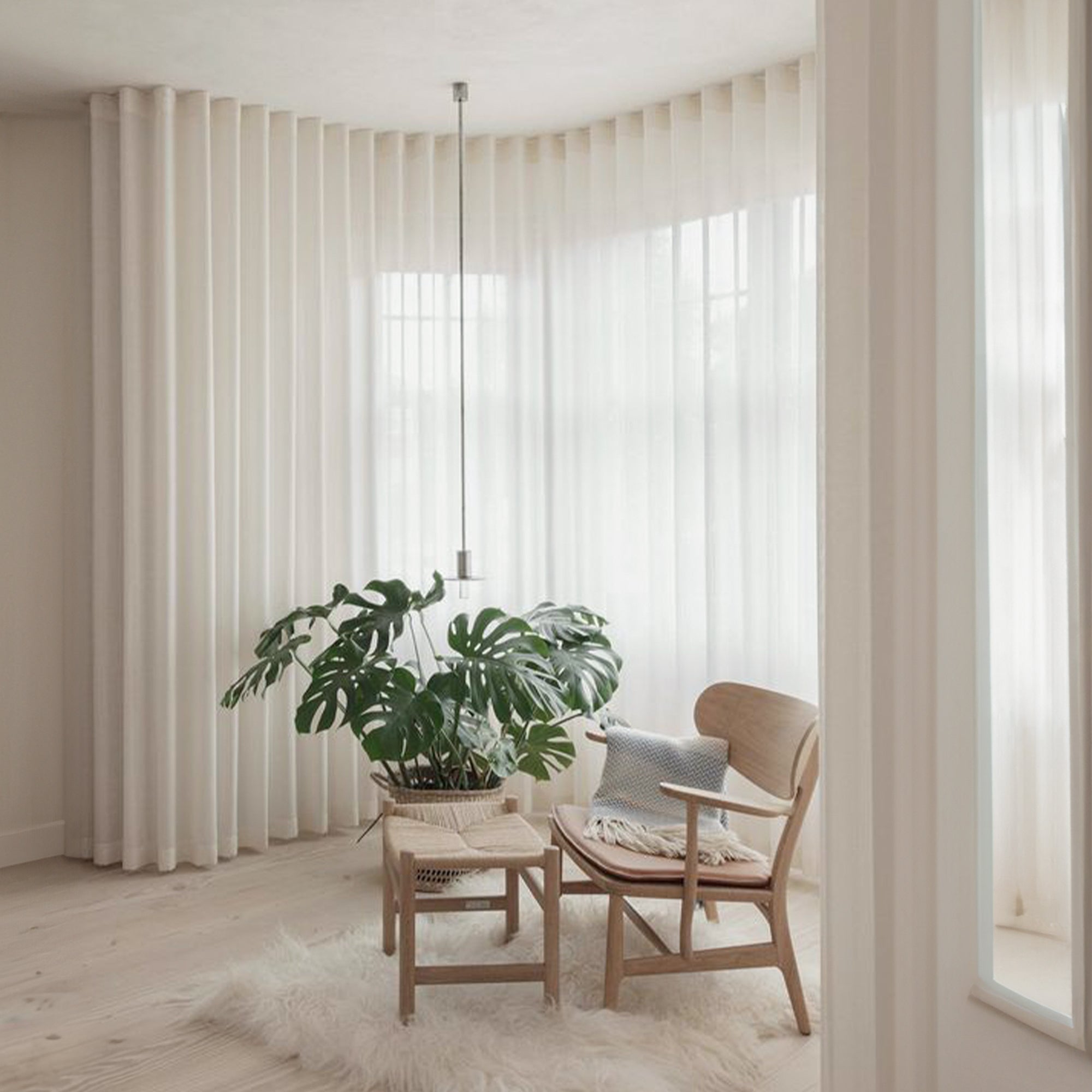 Elegant MARINA window curtain fabric in Crema color by QJDG, showcasing smooth drape and luxurious texture.