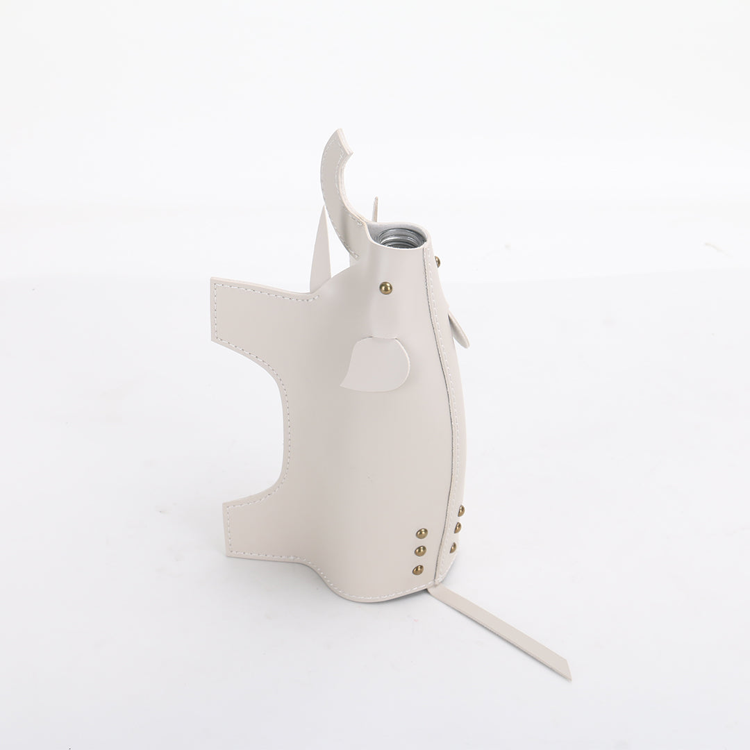 Beige elephant-shaped vase sculpture by BEACON, decorative ceramic vase featuring intricate details and a smooth finish.