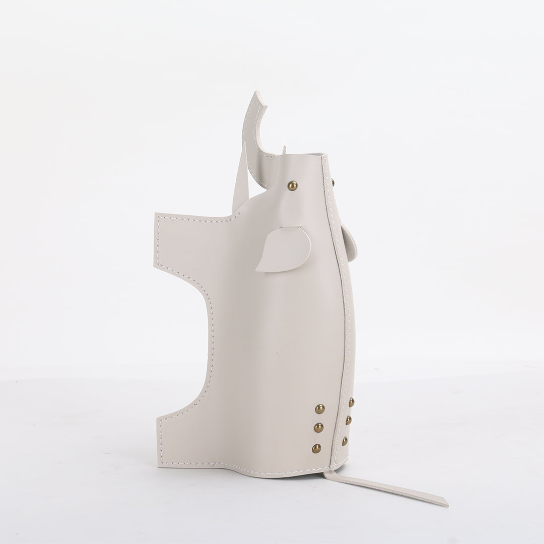 BEACON Elephant Vase sculpture, decorative ceramic vase shaped like an elephant, with detailed features and a smooth finish.