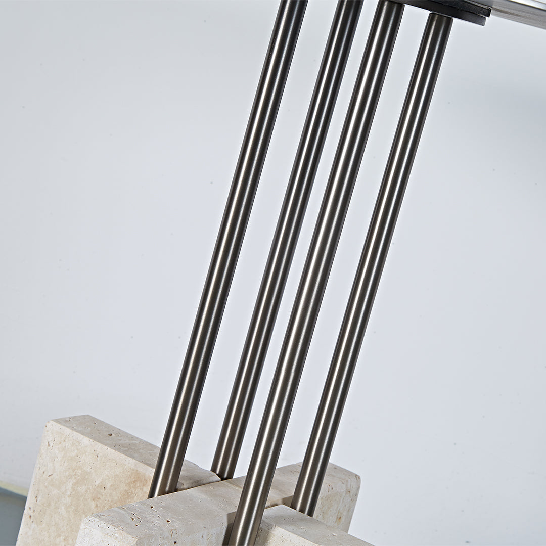 Elysian Travertine Side Table by BEACON featuring a sleek design with travertine surface and modern metal legs.