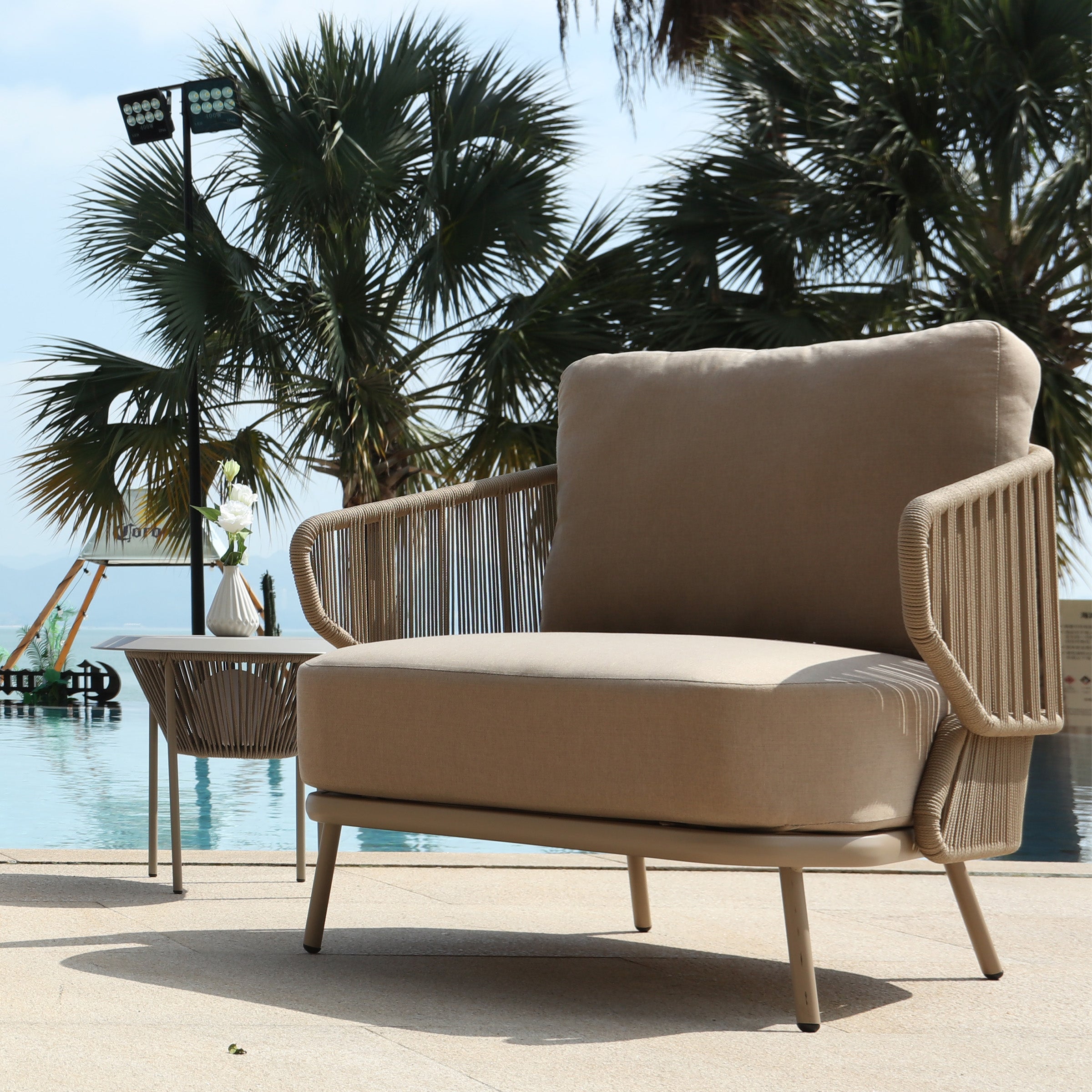 Outdoor BEACON Embrace MYX-SOFA030 armchair with cushioned seat and backrest, designed for comfortable outdoor lounging.