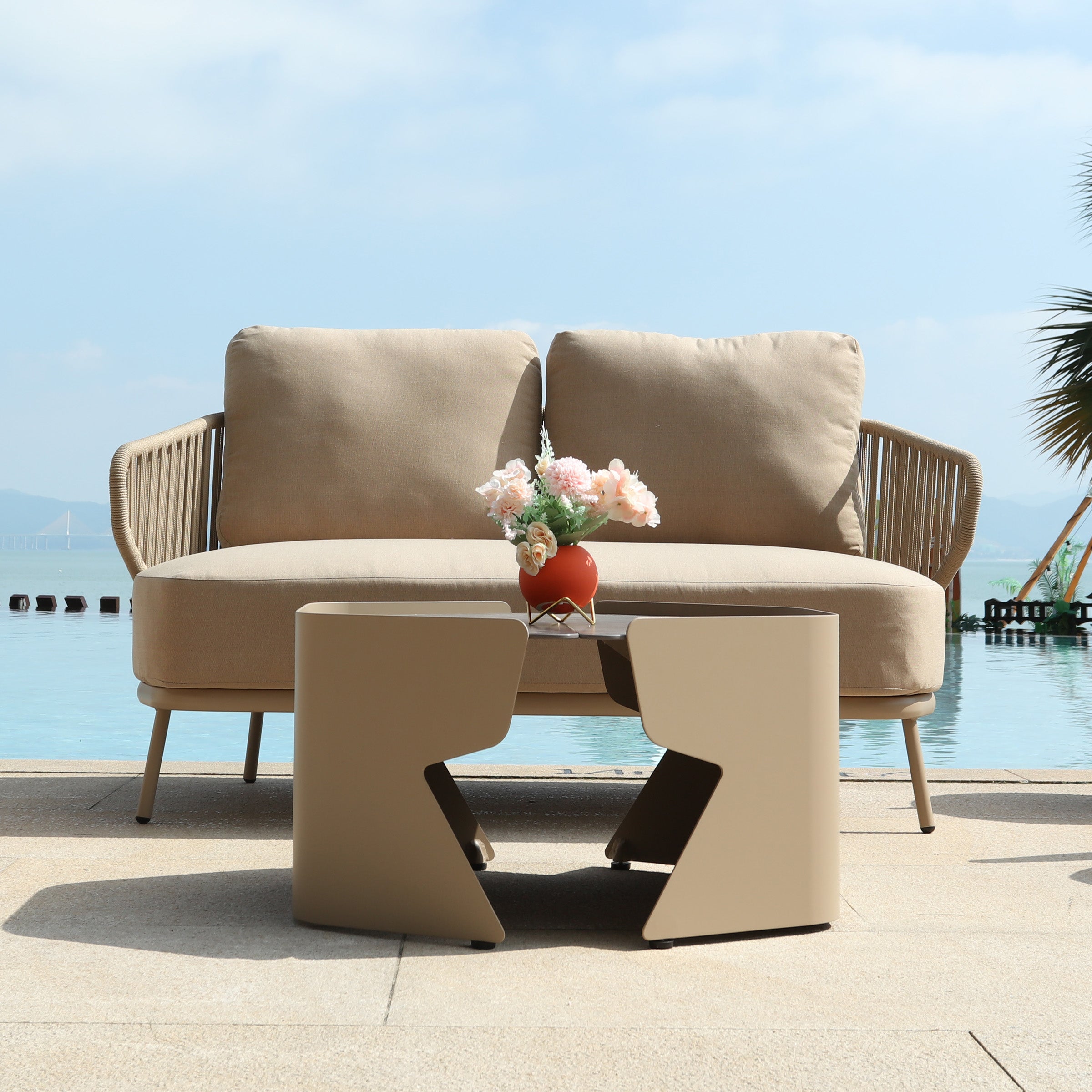 Outdoor BEACON Embrace Love 2-Seat Sofa with comfortable cushions, designed for outdoor living and relaxation.