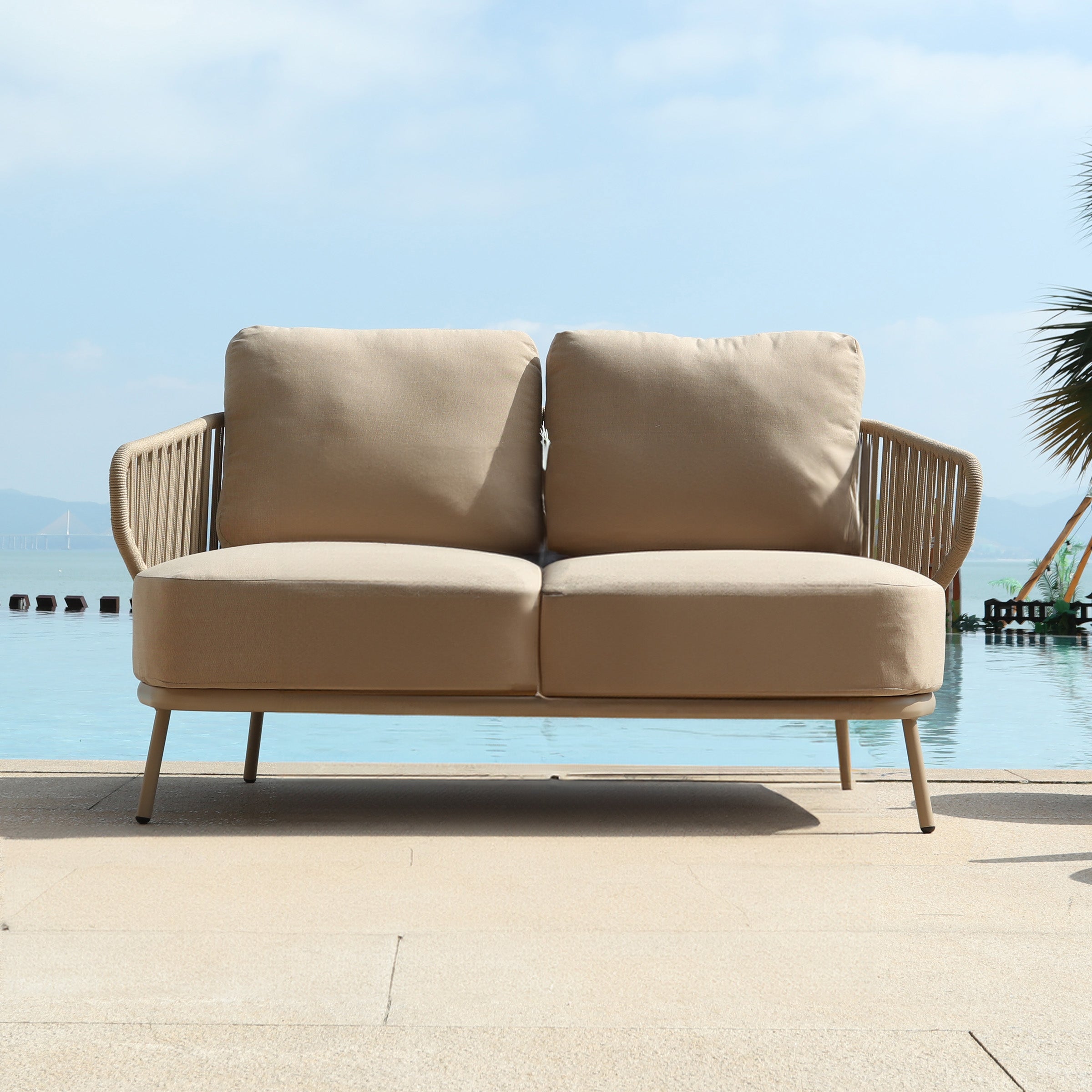 Embrace Outdoor Love 2-Seat Sofa by BEACON, stylish outdoor sofa with comfortable cushions and modern design.