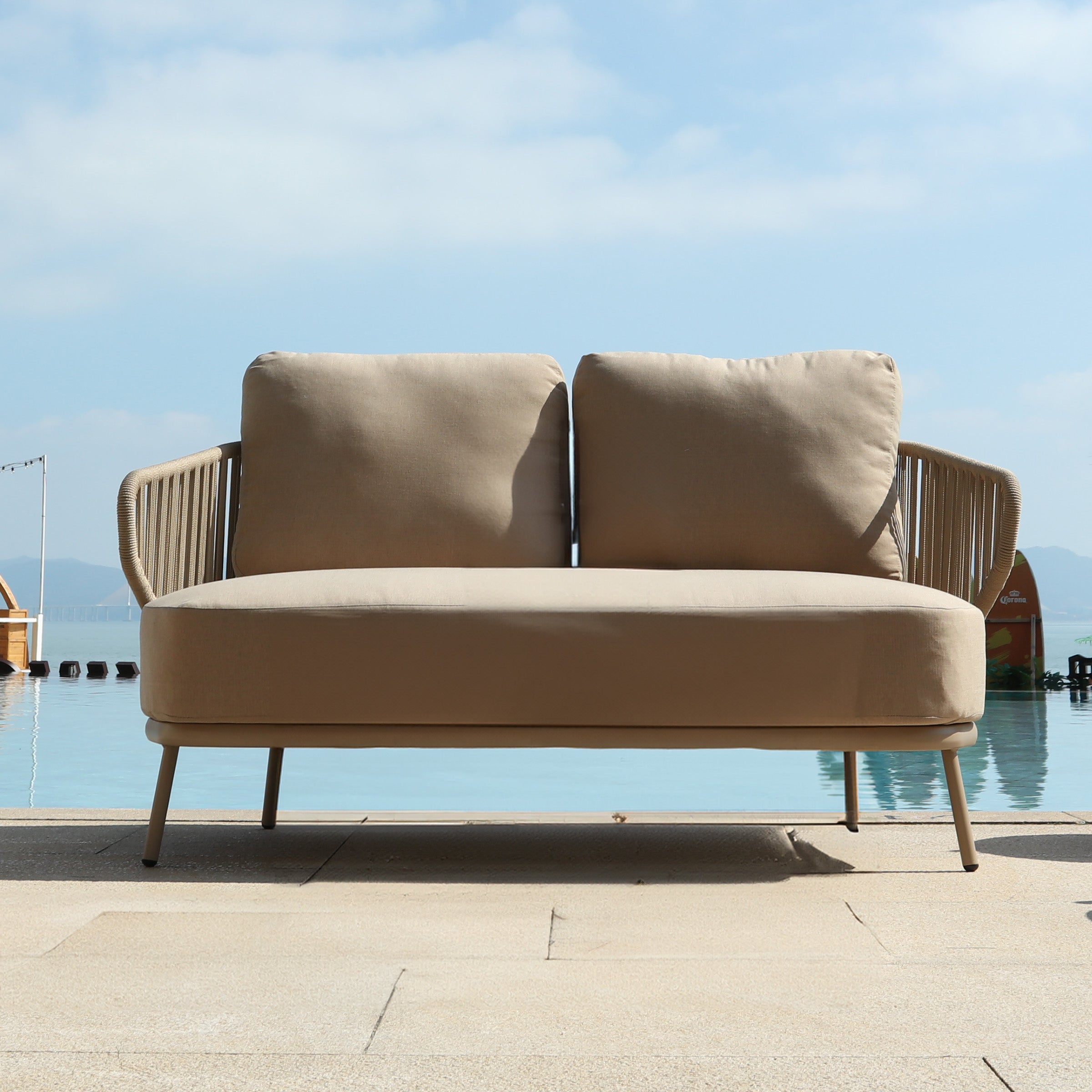 Outdoor BEACON Embrace Love 2-Seat Sofa with cushioned seating and sturdy frame, perfect for patio or garden relaxation.