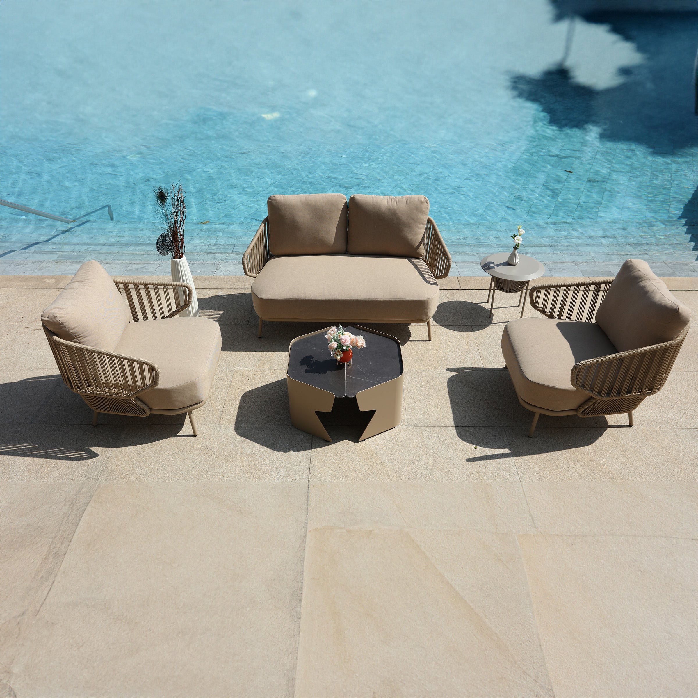 Outdoor Love 2-Seat Sofa by BEACON, stylish outdoor sofa with cushioned seating perfect for relaxing outdoors.
