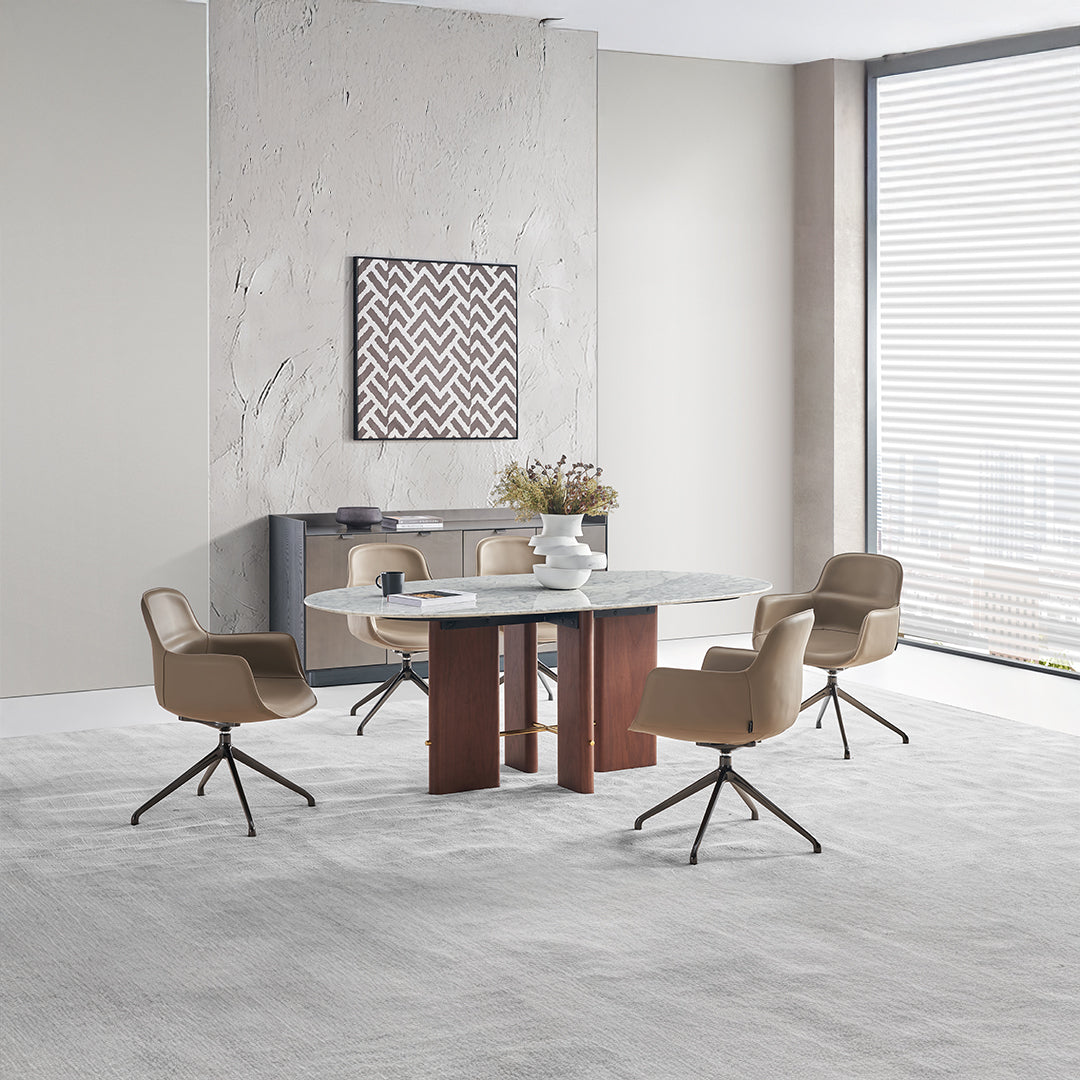 Beige saddle leather dining chair with contoured seat and wooden legs, designed for comfortable dining room seating.