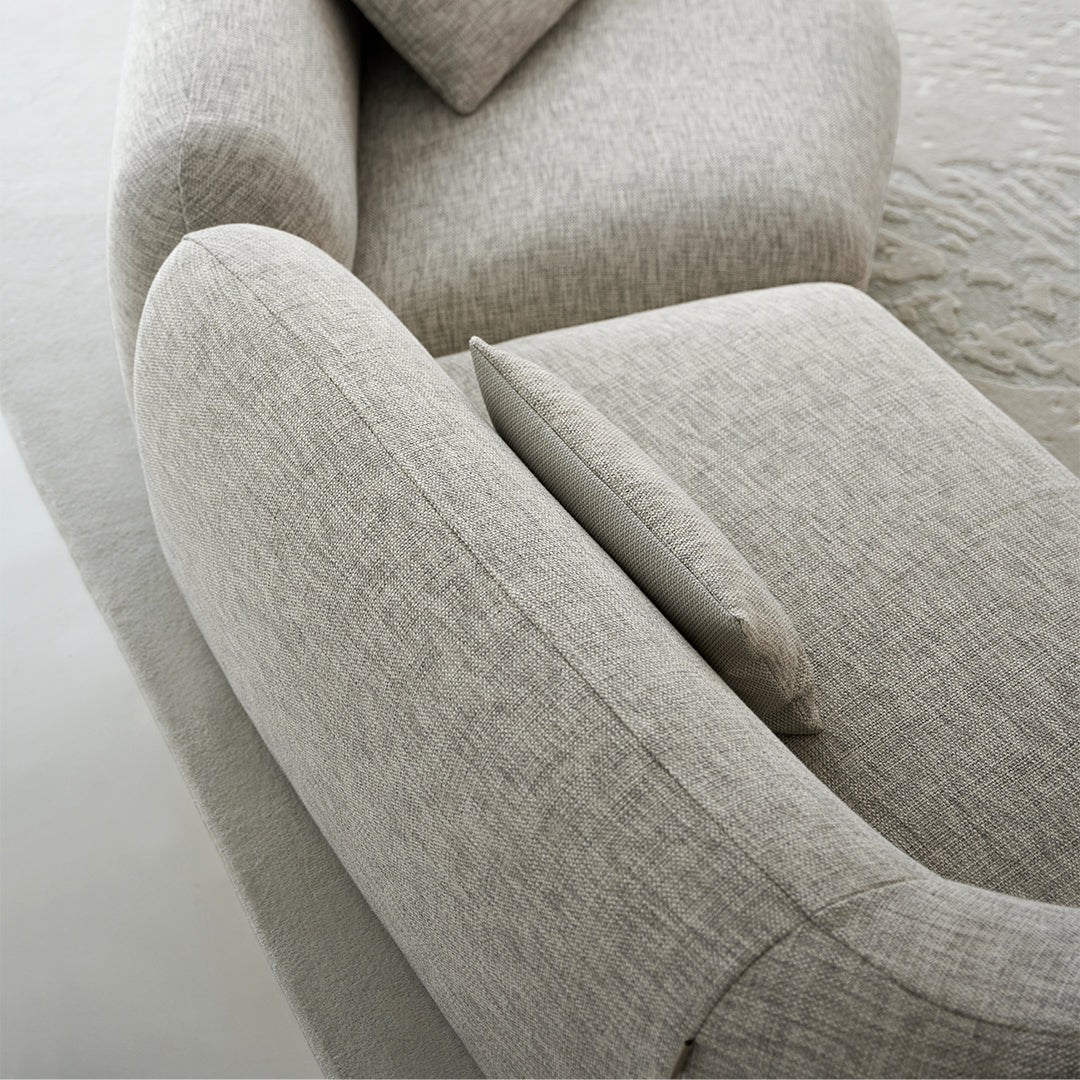 BEACON Euphoria 4 Seater Curved Sofa in neutral fabric, showcasing its modern design and comfortable seating.