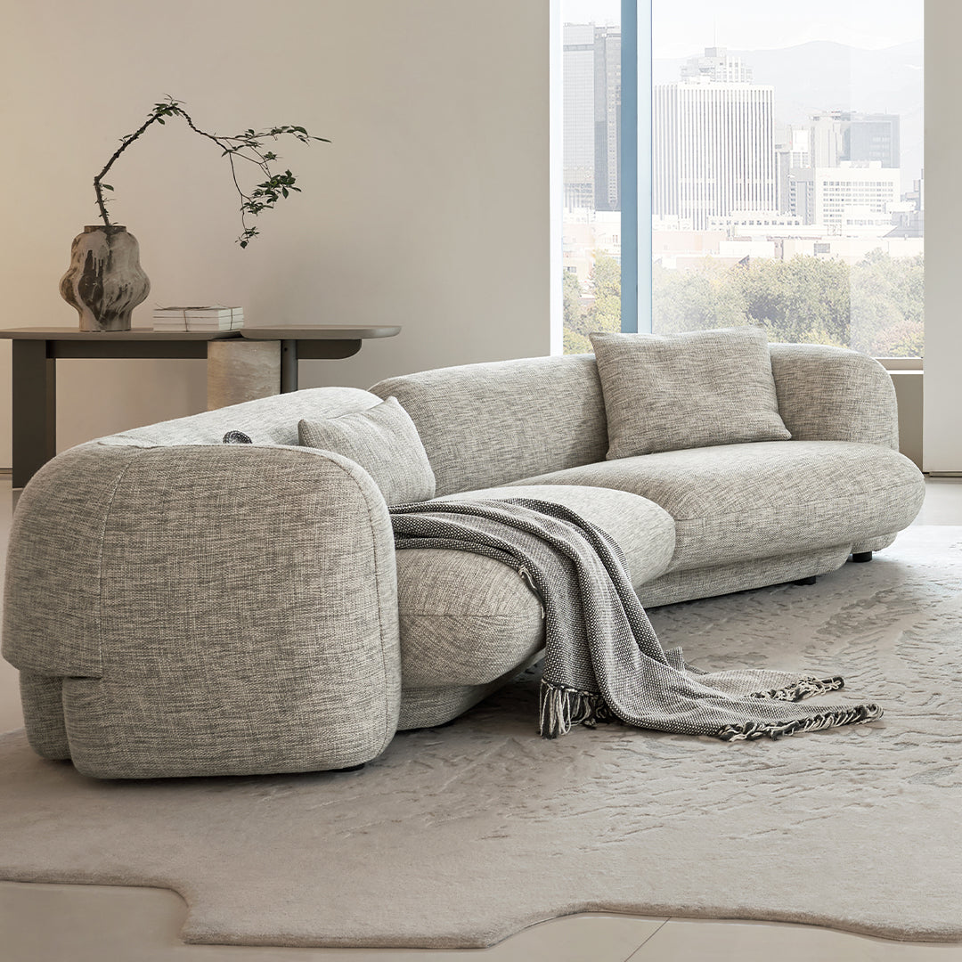 Euphoria 4-seater curved sofa by Beacon, featuring plush upholstery and modern design, perfect for living room seating.