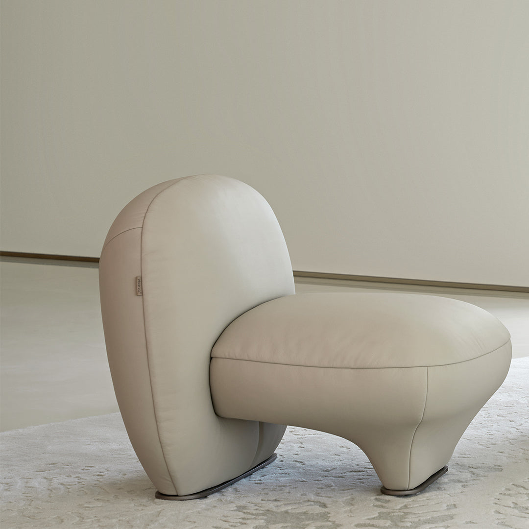Euphoria Armchair by BEACON, plush fabric upholstery with a modern design, featuring a comfortable, stylish armchair for living rooms.