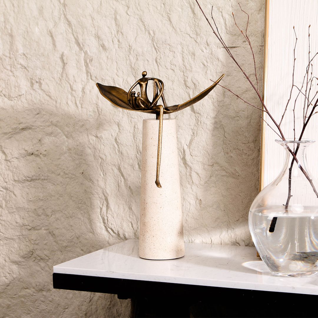 Family Harmony Sculpture by BEACON, a home decor figurine depicting a harmonious family scene in detailed craftsmanship.