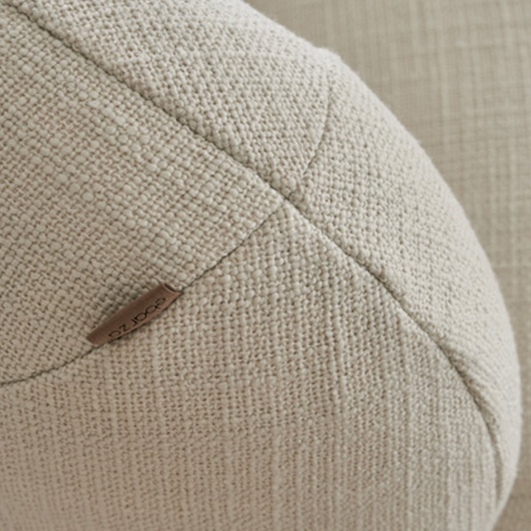 BEACON Ferrara armchair AMCJ-DY6057 with plush upholstery and modern design, shown in a cozy living room setting.