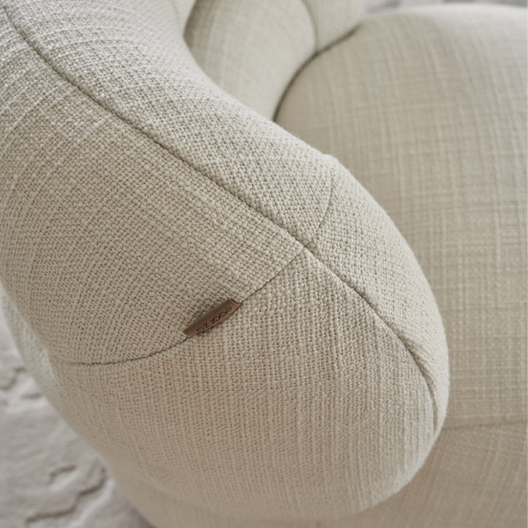 BEACON Ferrara armchair AMCJ-DY6057 with plush fabric upholstery and contemporary design for living room comfort.