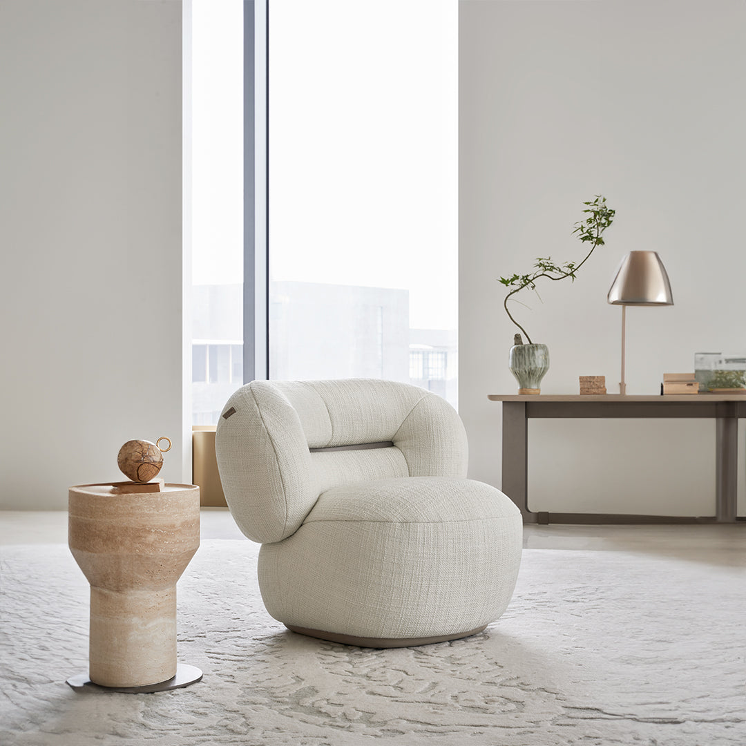 BEACON Ferrara armchair AMCJ-DY6057 with plush upholstery and modern design, shown in a stylish living room setting.