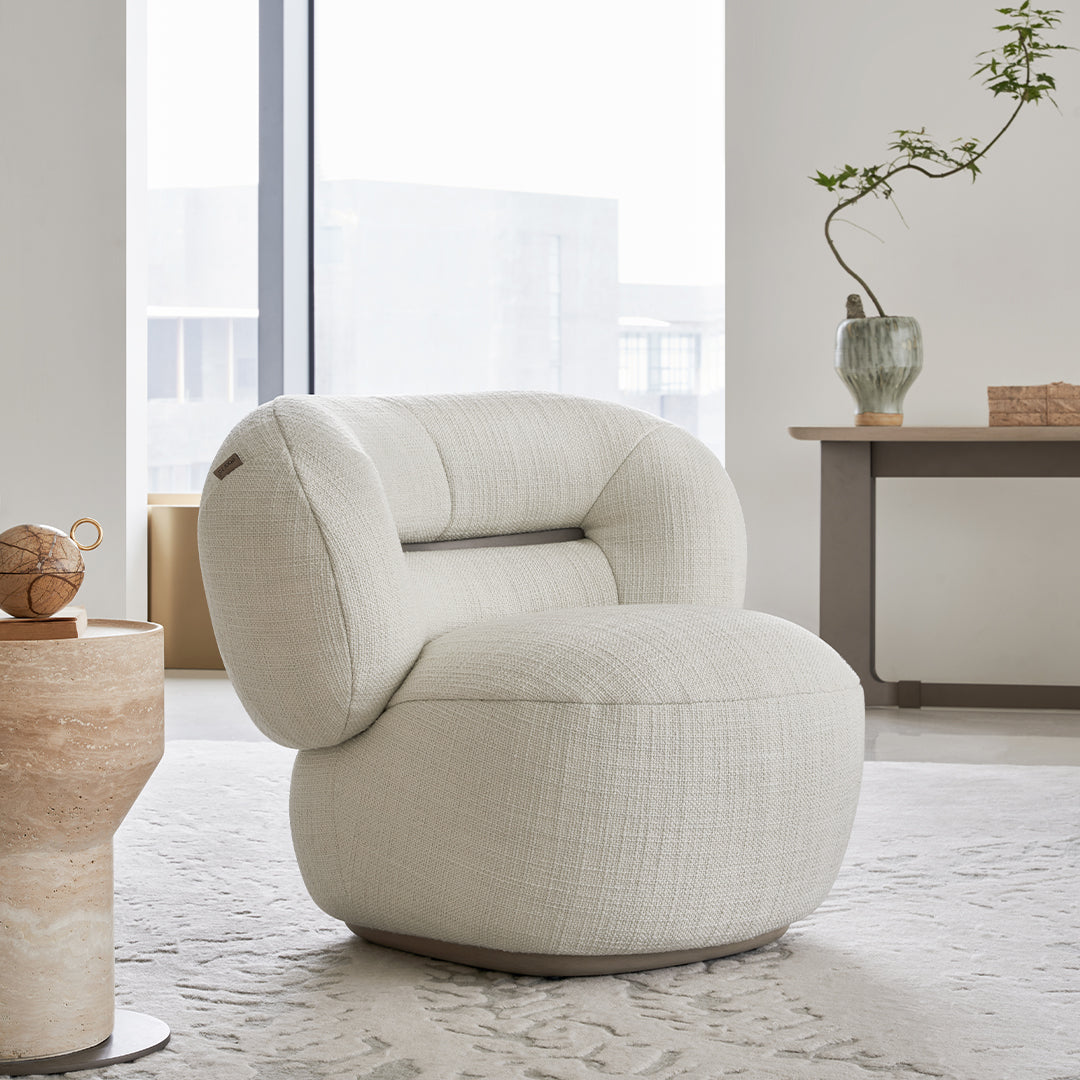 BEACON Ferrara armchair AMCJ-DY6057 with plush upholstery and stylish design, shown in a cozy living room setting.