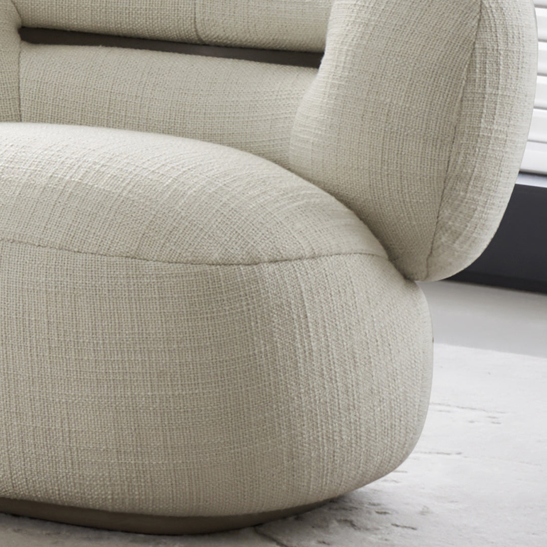 BEACON Ferrara Armchair AMCJ-DY6057 with plush upholstery and modern design, shown from a front angle in a stylish living room setting.
