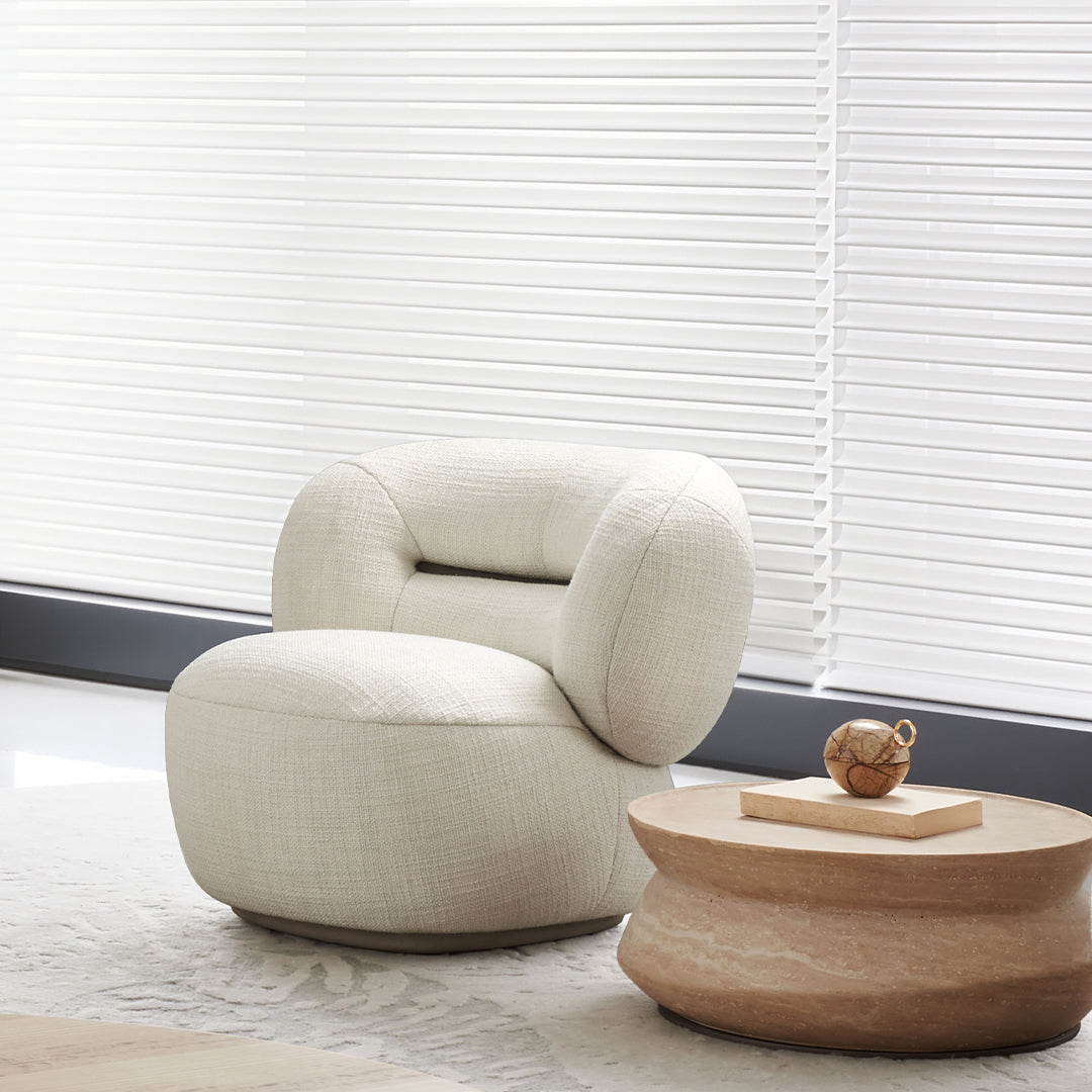 BEACON Ferrara armchair AMCJ-DY6057 with plush upholstery and modern design, shown from a front view.