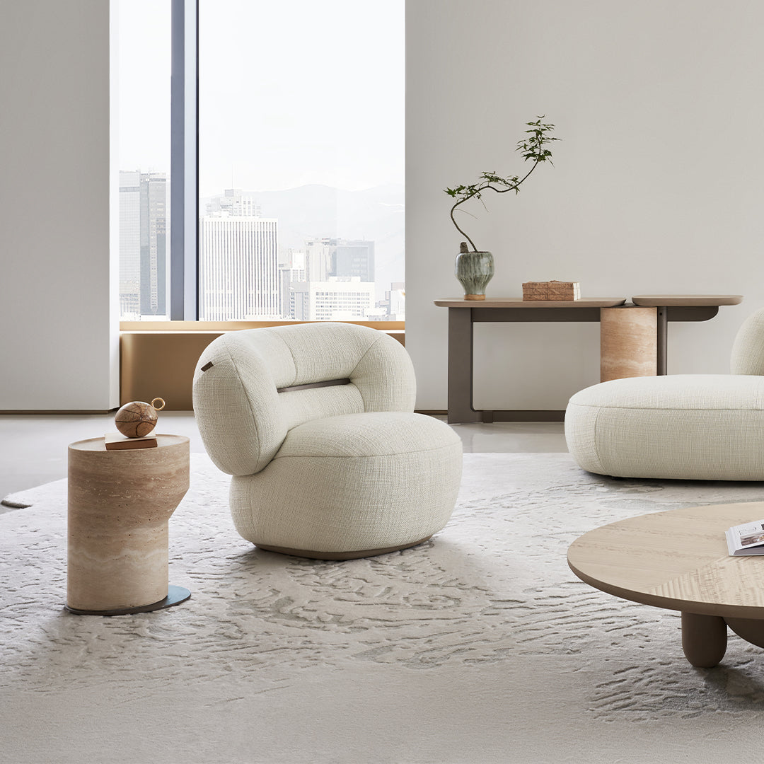BEACON Ferrara armchair AMCJ-DY6057 with plush fabric and padded armrests, modern design for comfortable seating.