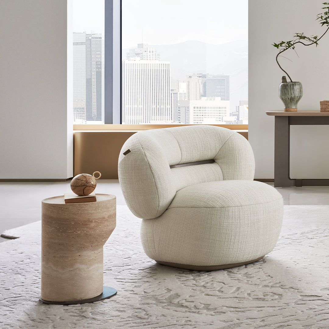 BEACON Ferrara armchair AMCJ-DY6057 with plush fabric upholstery and modern design, shown from a front view.