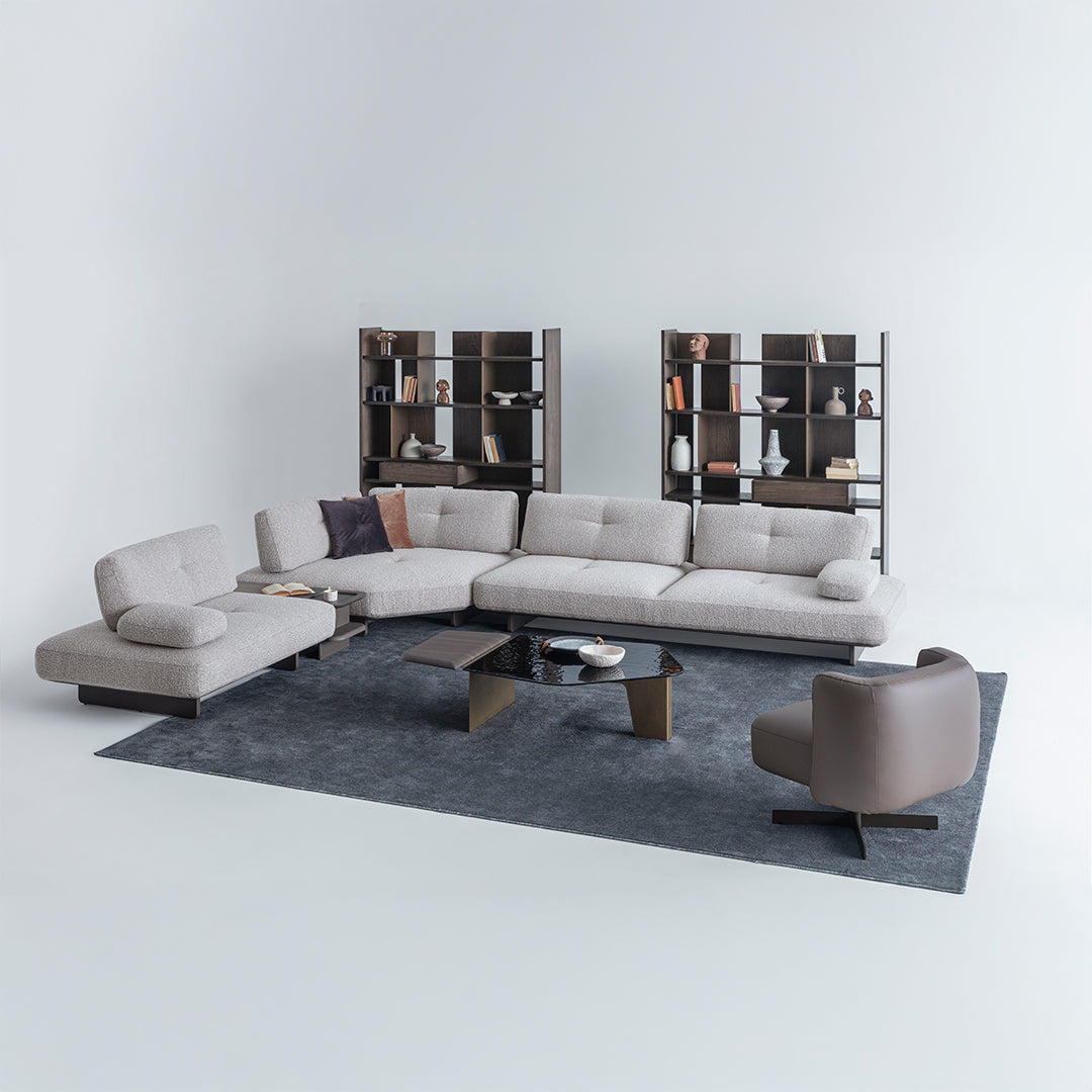 Foresta Corner Sofa by HOMAGE KOLTUK with modular design, featuring a side table unit and plush seating in a modern living room setting.