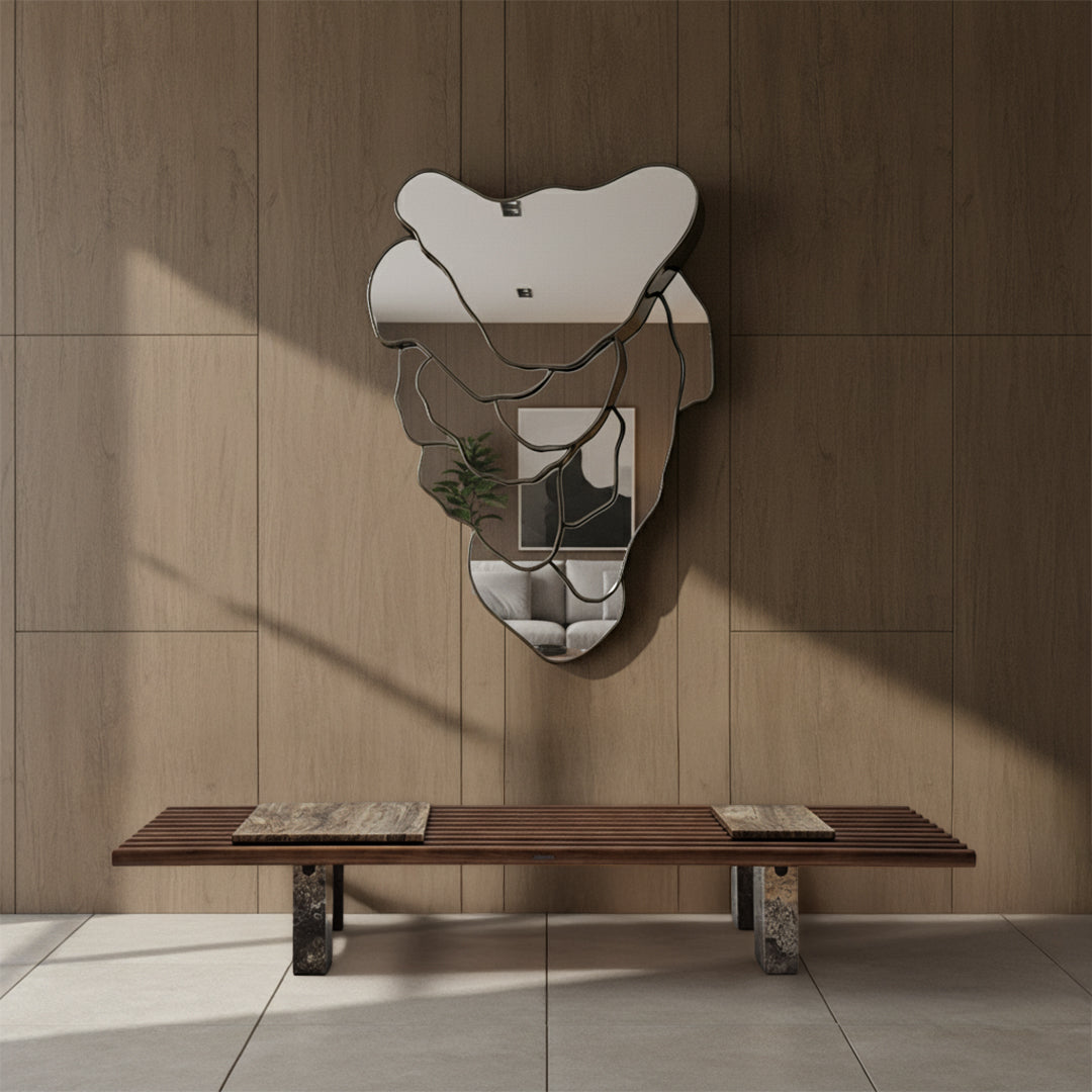 Framed wall mirror in plated grey black finish, modern design, with sleek rectangular shape and reflective glass surface.