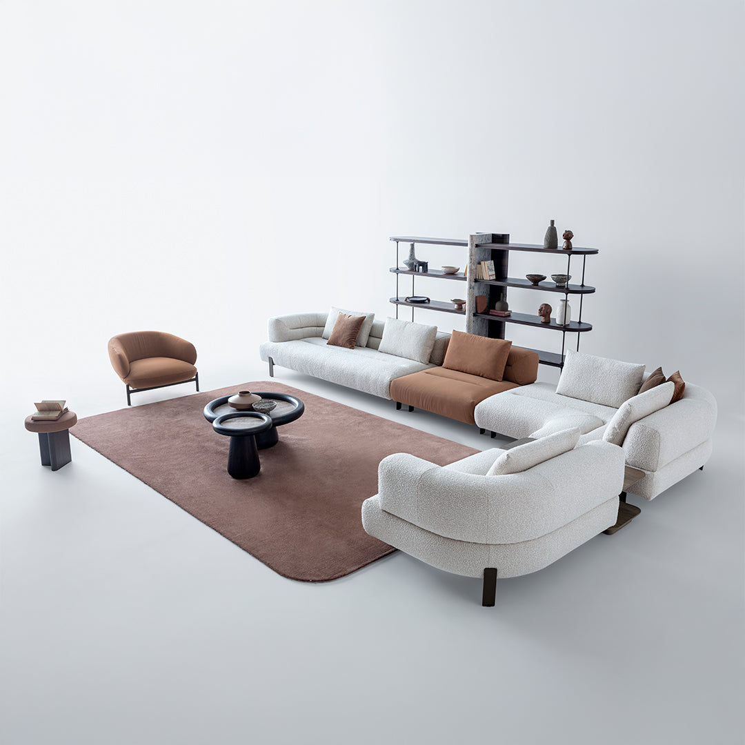 Display of HOMAGE KOLTUK Freda Corner Sofa HM-FREDA01 in a modern living room setting, showcasing its fabric upholstery and corner design.