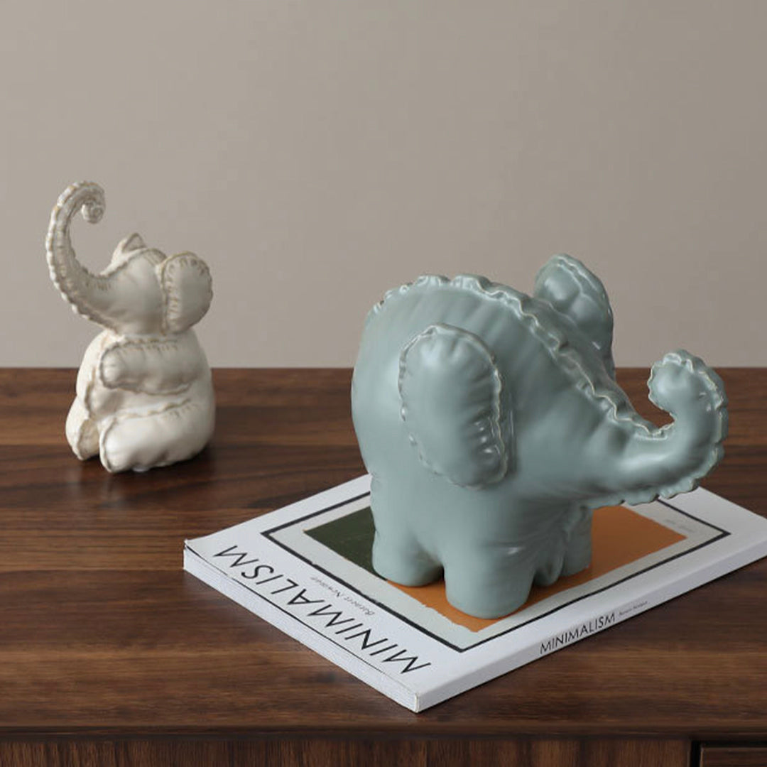 Funny little ceramic elephant home decor figurine by BEACON, detailed ceramic animal sculpture for interior decoration.
