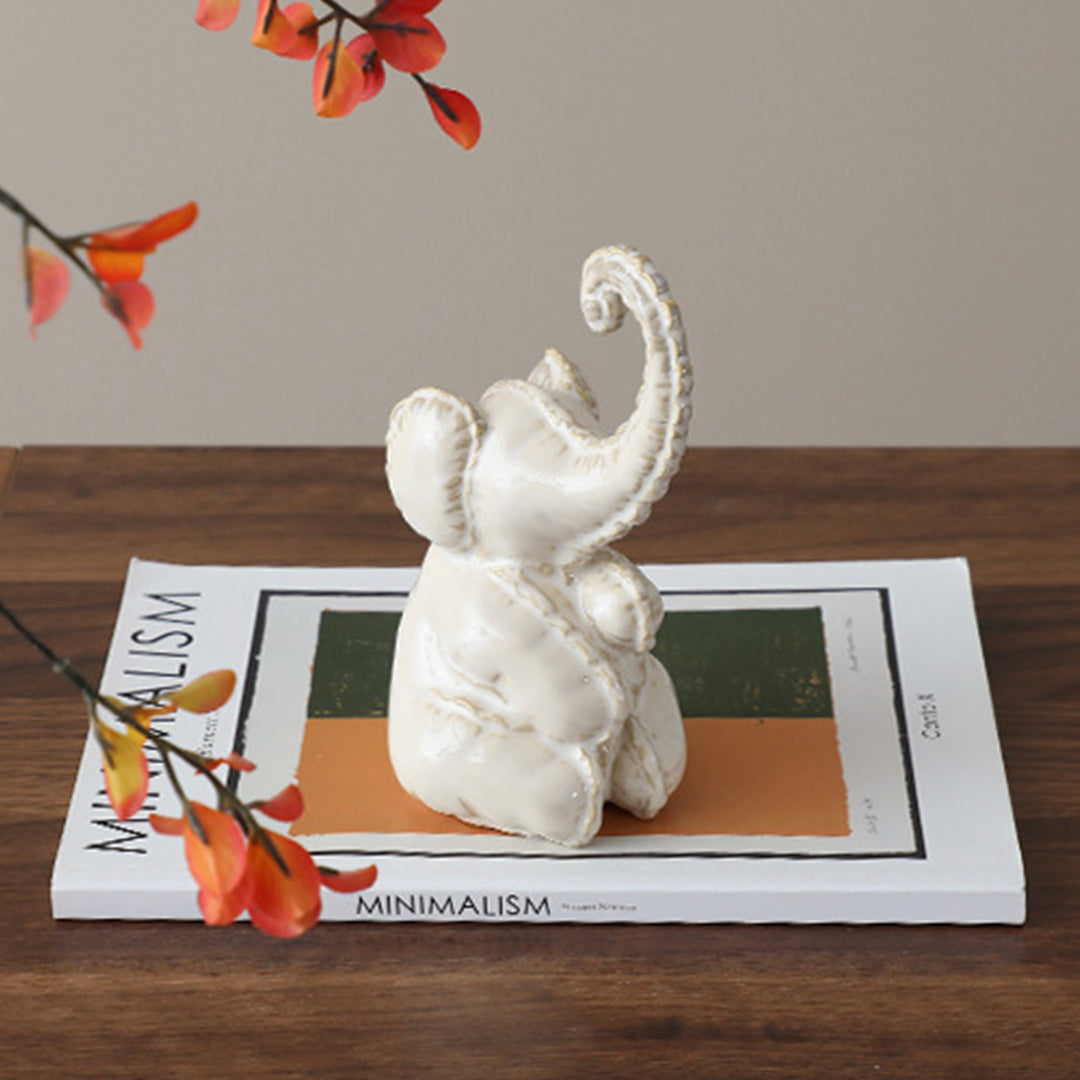 Funny Little Ceramic Elephant -B FD-D25075B -  Home Decor Figurines - ebarza Furniture UAE | Shop Modern Furniture in Abu Dhabi & Dubai - مفروشات ايبازرا في الامارات | تسوق اثاث عصري وديكورات مميزة في دبي وابوظبي