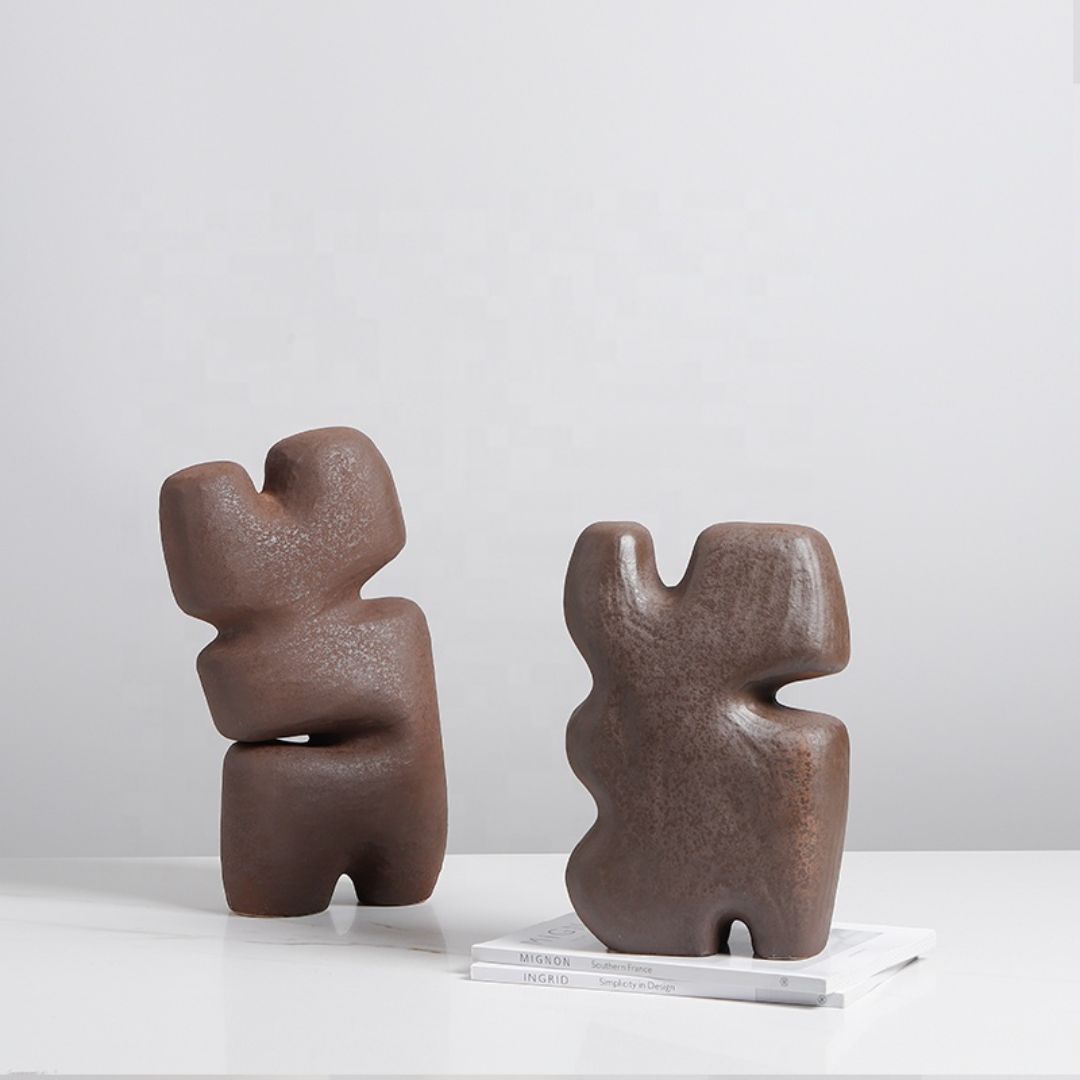 Beige geometric layered block figurine by BEACON for home decor, modern abstract sculpture, stylish decorative piece.