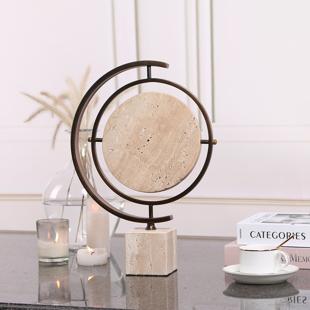 Marble globe sculpture for home decor by BEACON, featuring detailed craftsmanship and a smooth, polished finish.